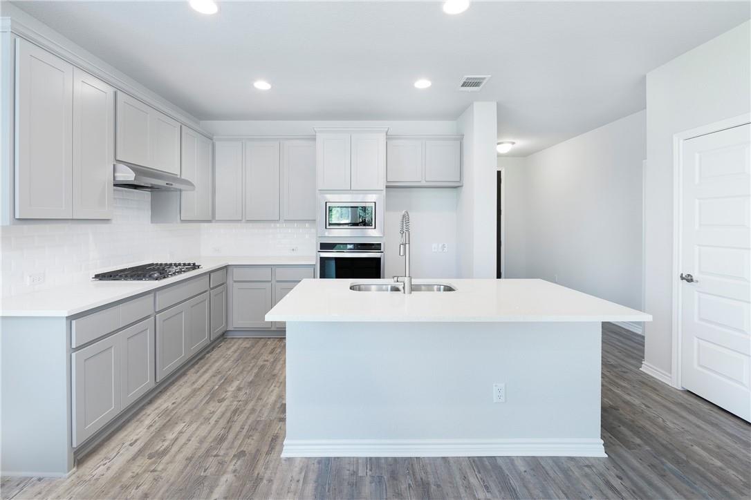 1613 Winding Stream Trl # 75, Leander, TX 78641