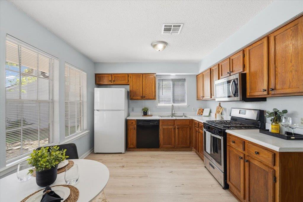 7702 Fenton Cv, Austin, TX 78736