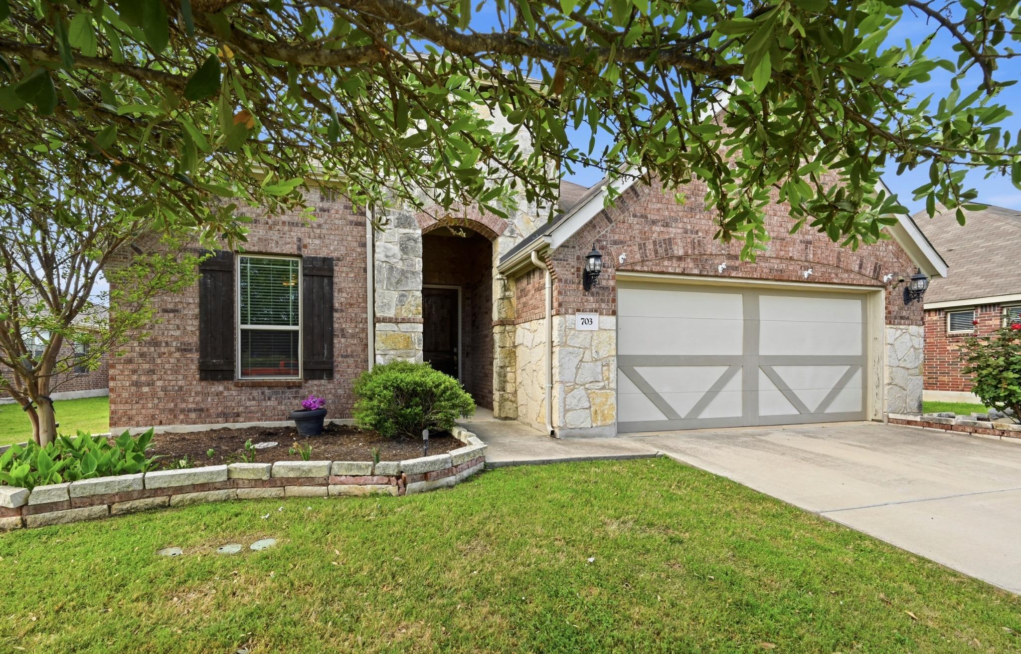 703 N Emory Cv, Hutto, TX 78634