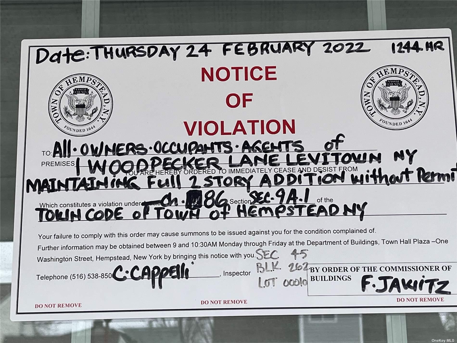 1 Woodpecker Lane, Levittown, NY 11756