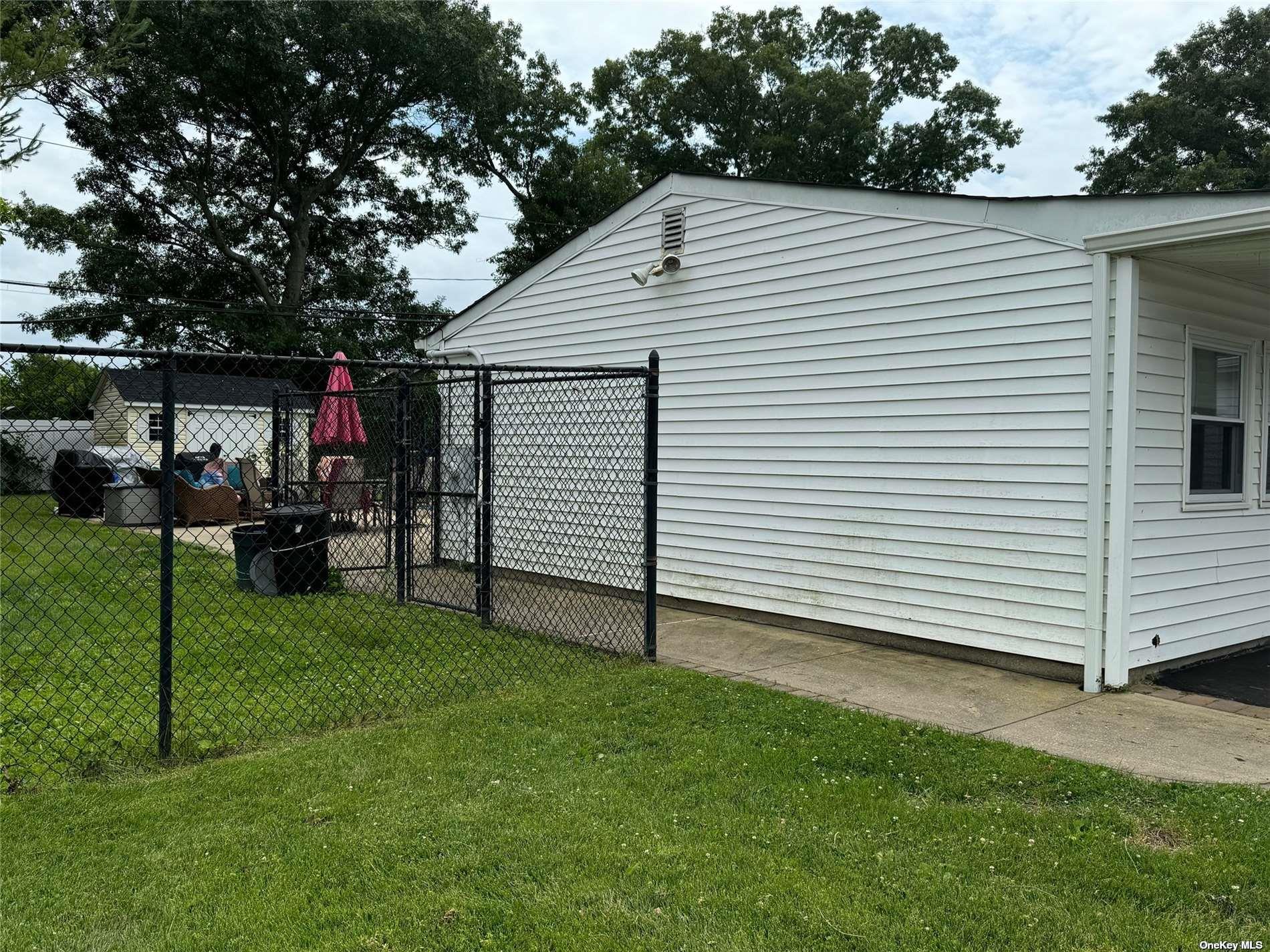 47 College Hills Drive, Farmingville, NY 11738