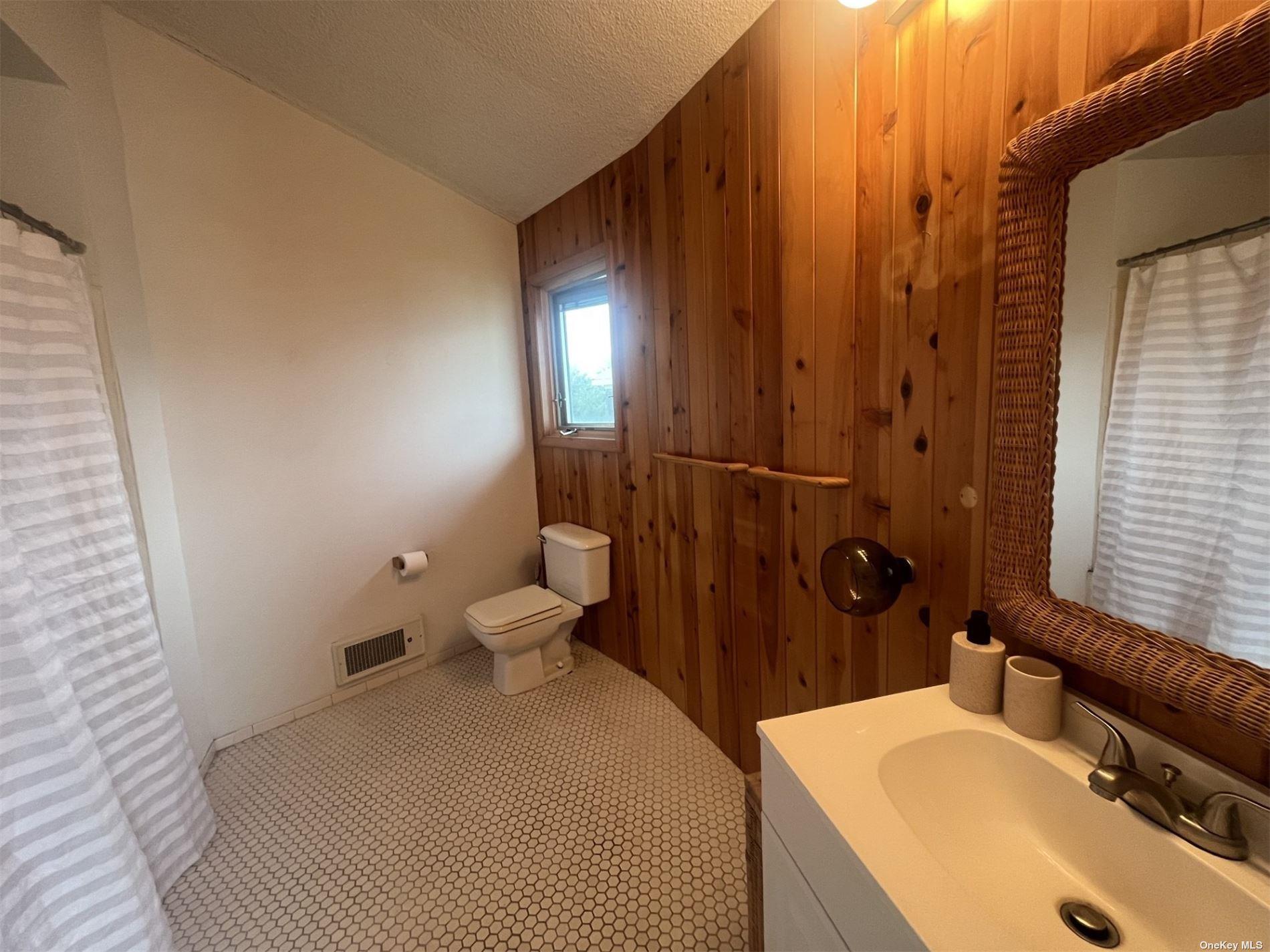 85 Bungalow Walk, Ocean Beach, NY 11770