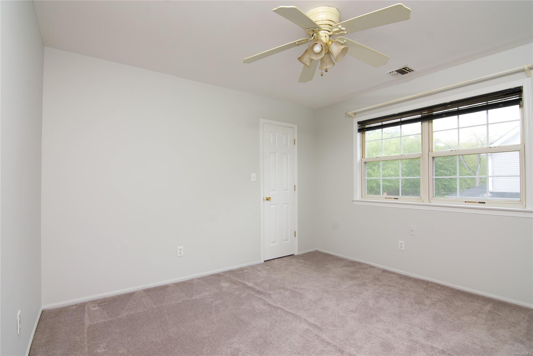 25 Whispering Woods Drive, Smithtown, NY 11787