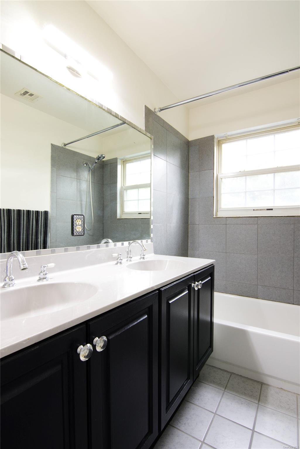 25 Whispering Woods Drive, Smithtown, NY 11787