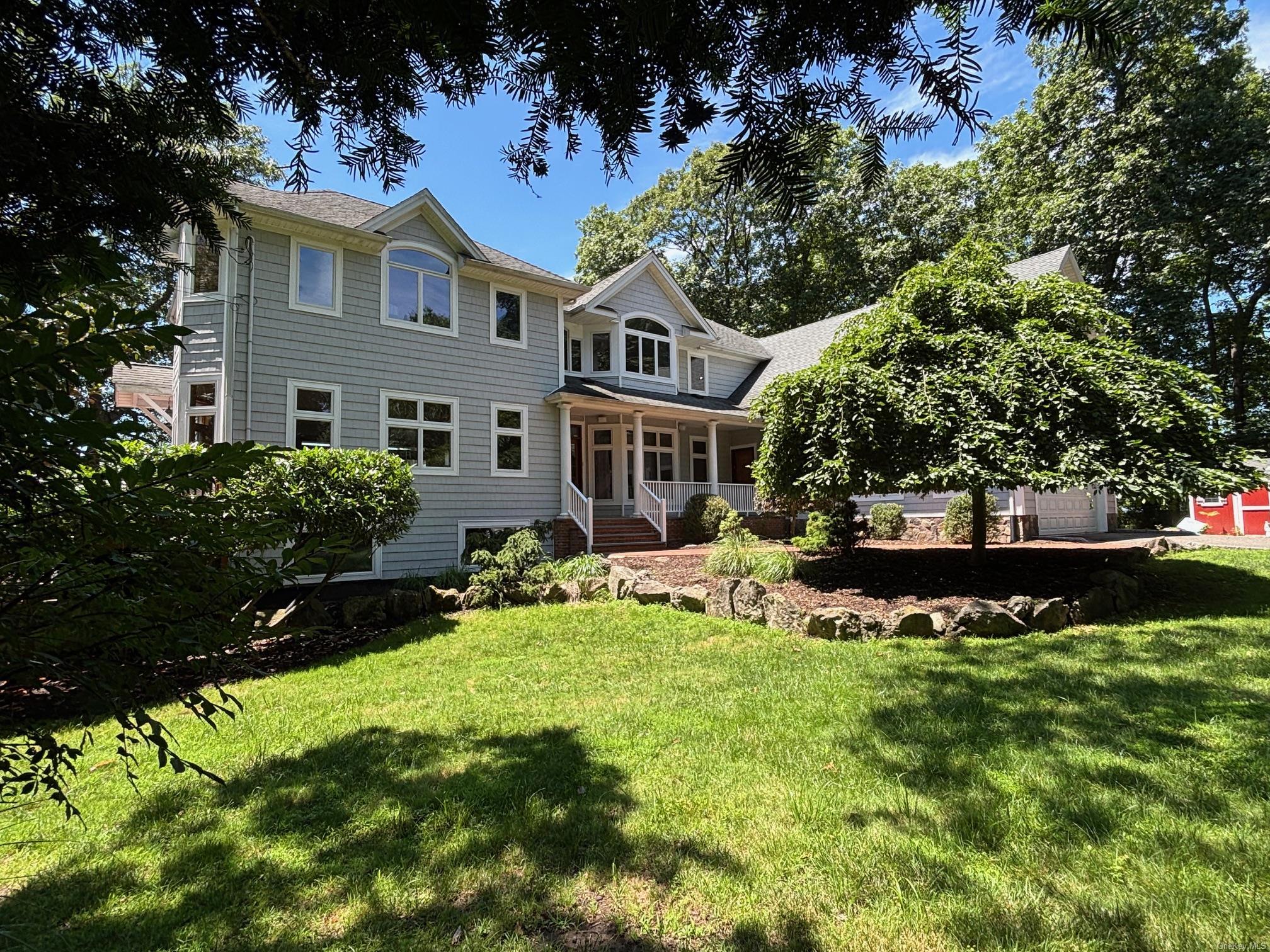22 Flax Pond Woods Road, East Setauket, NY 11733