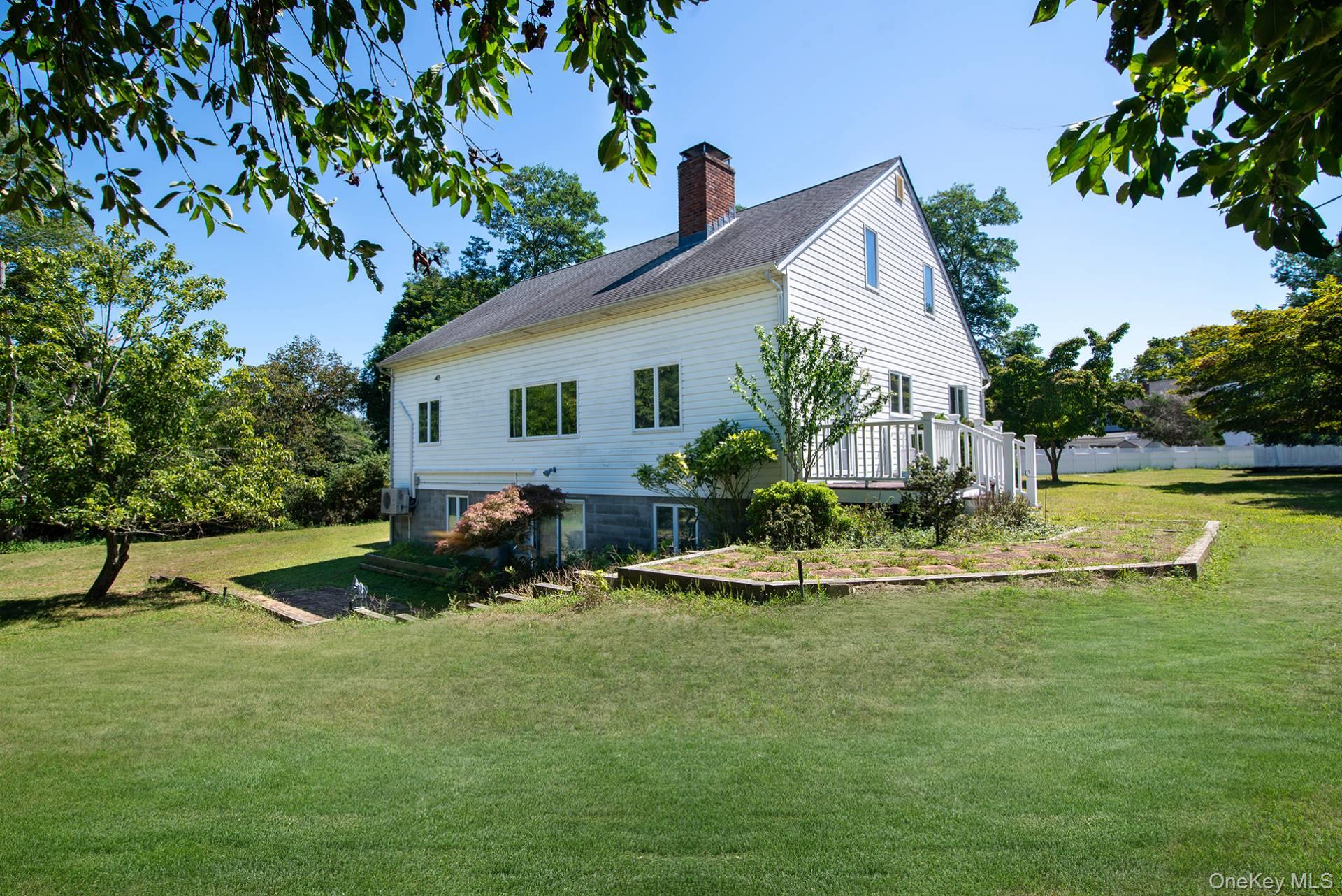 13 West End Avenue, East Quogue, NY 11942