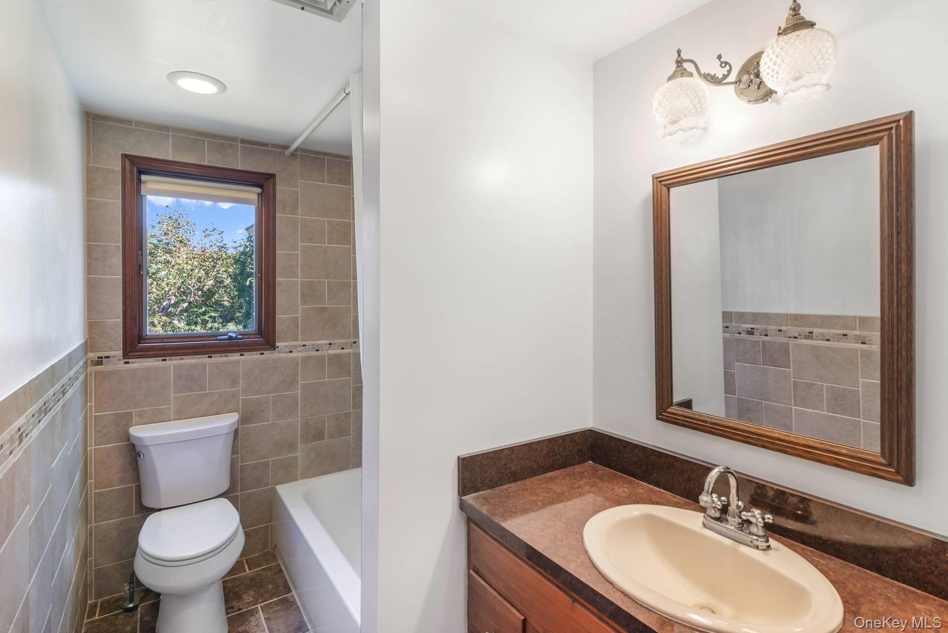 13 West End Avenue, East Quogue, NY 11942