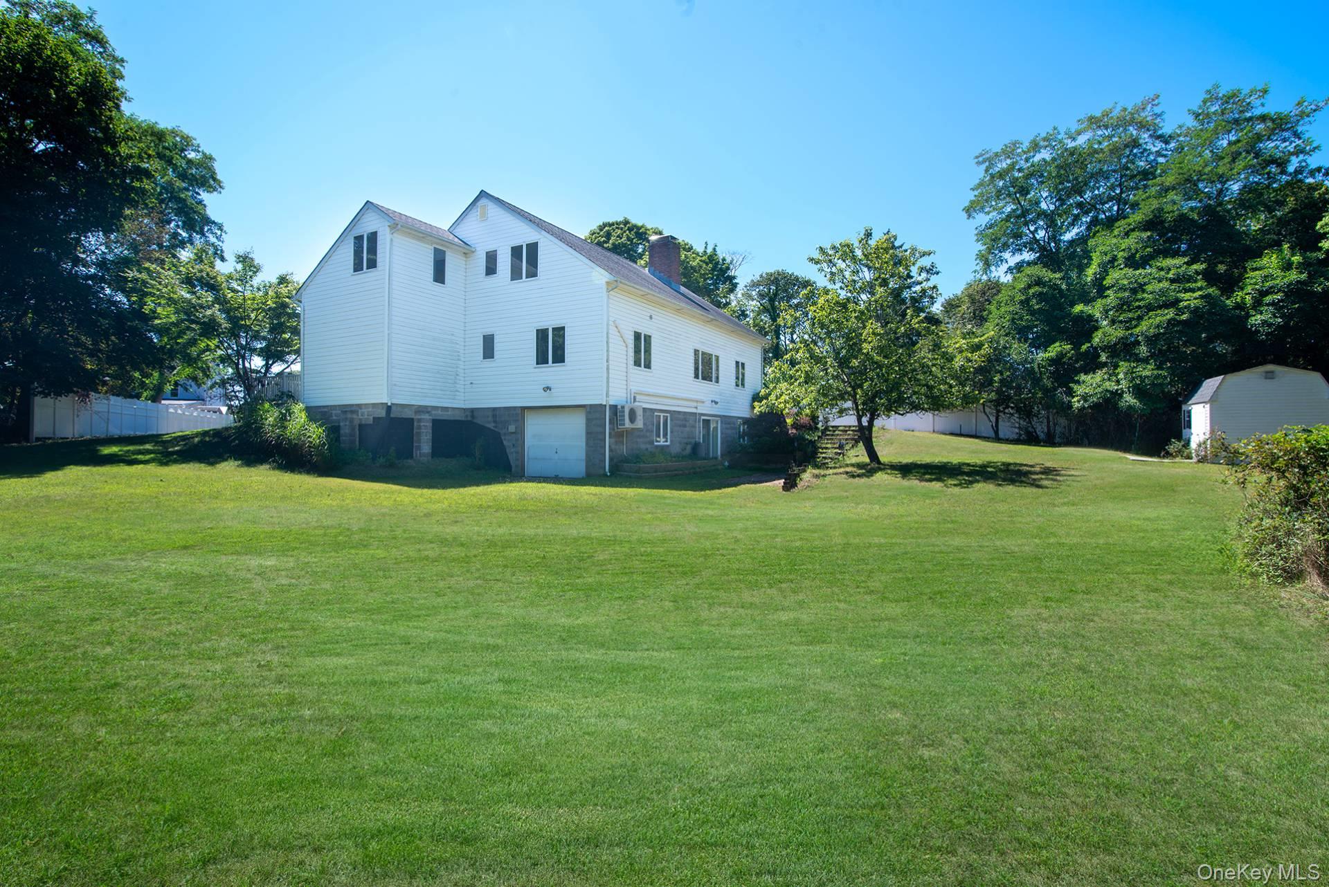 13 West End Avenue, East Quogue, NY 11942