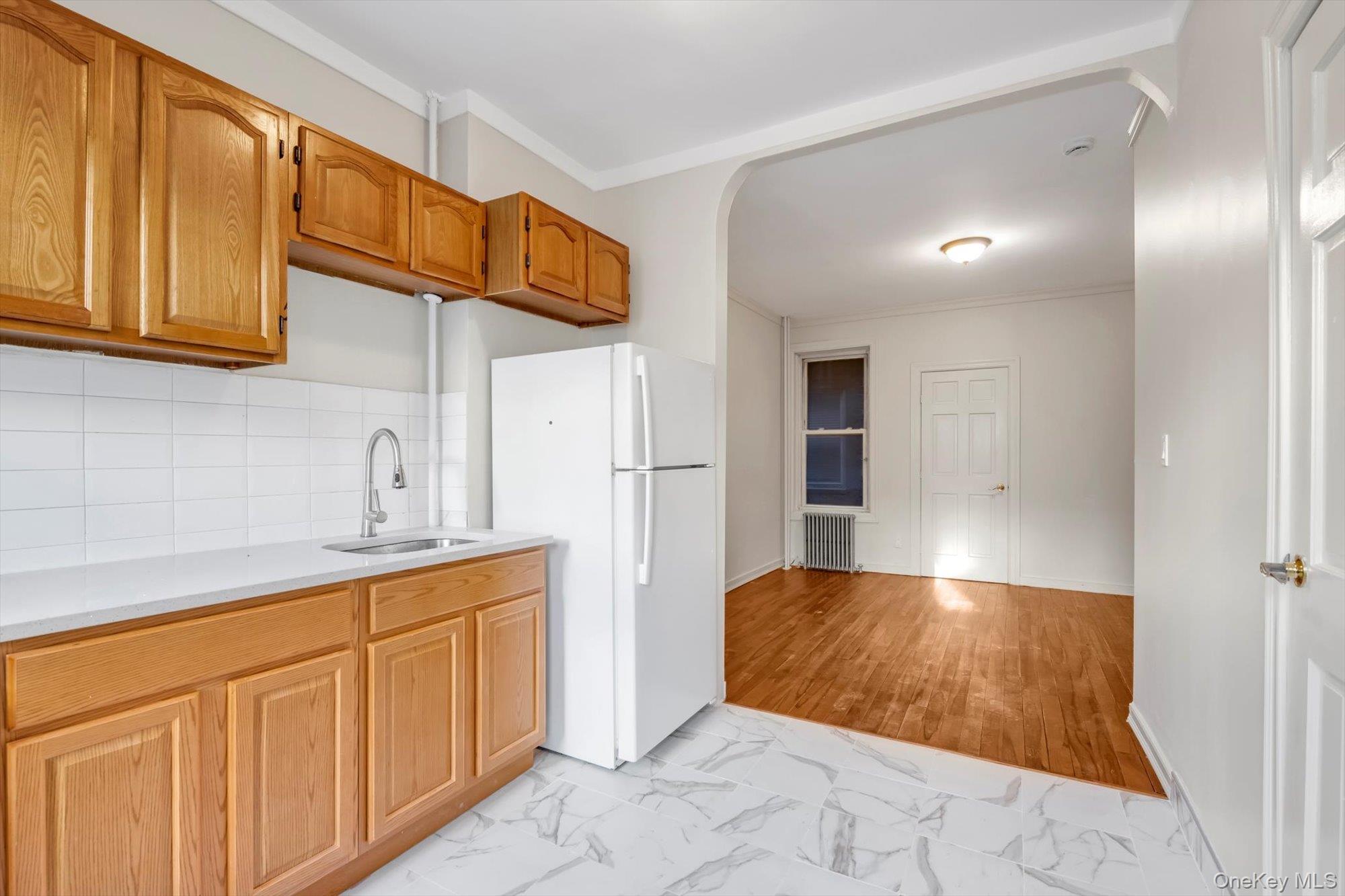 71-11 67th Place, Glendale, NY 11385