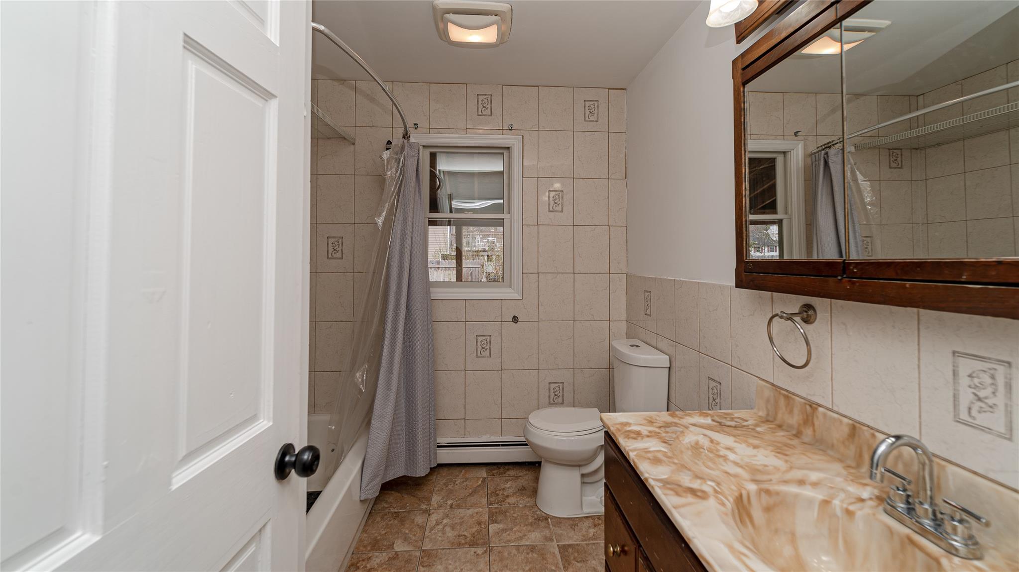 93 Tyler Avenue, Sound Beach, NY 11789