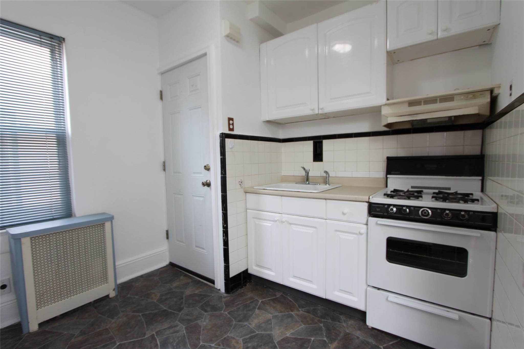 79-65 69th Road, Middle Village, NY 11379