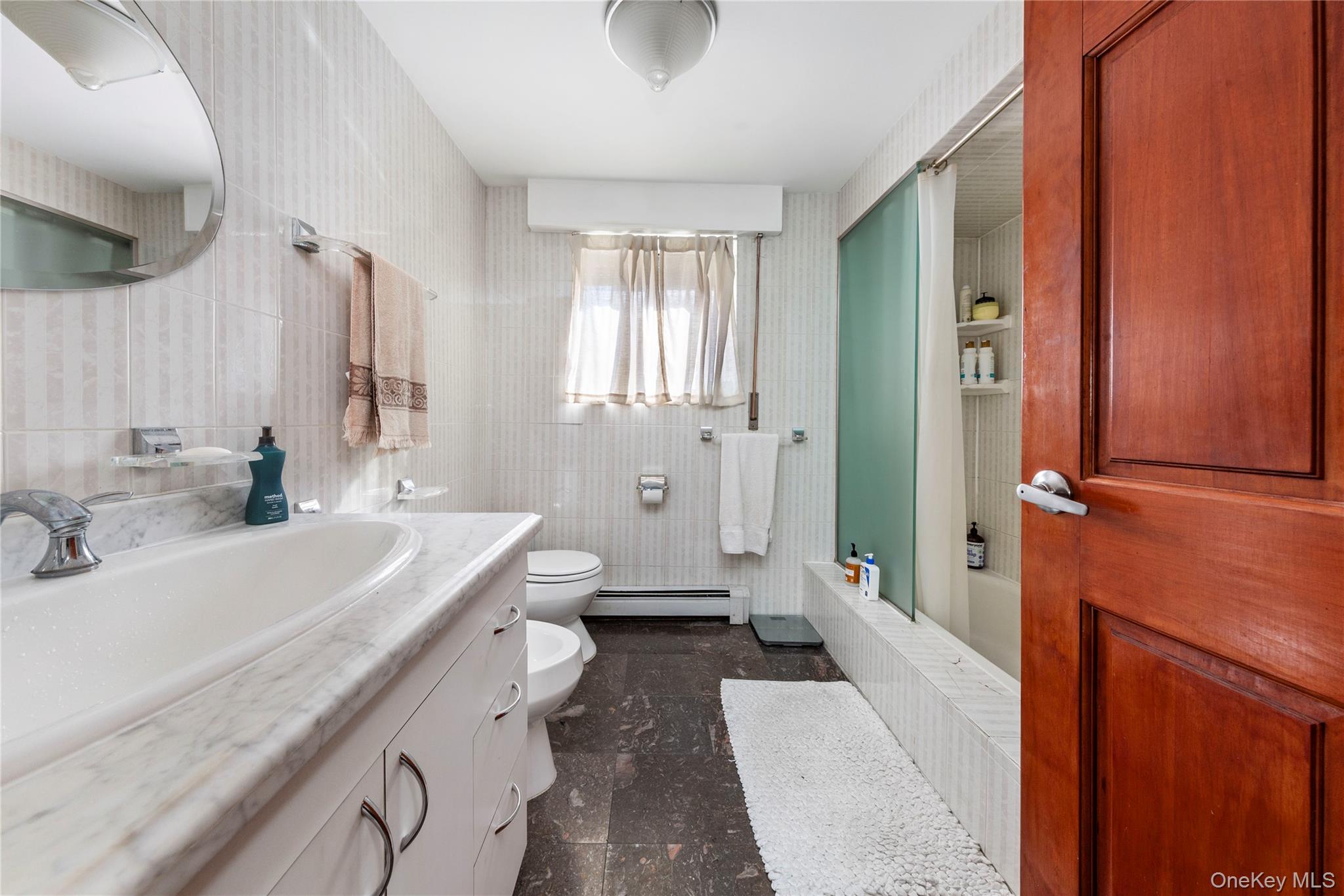 66-14 49th Avenue, Woodside, NY 11377