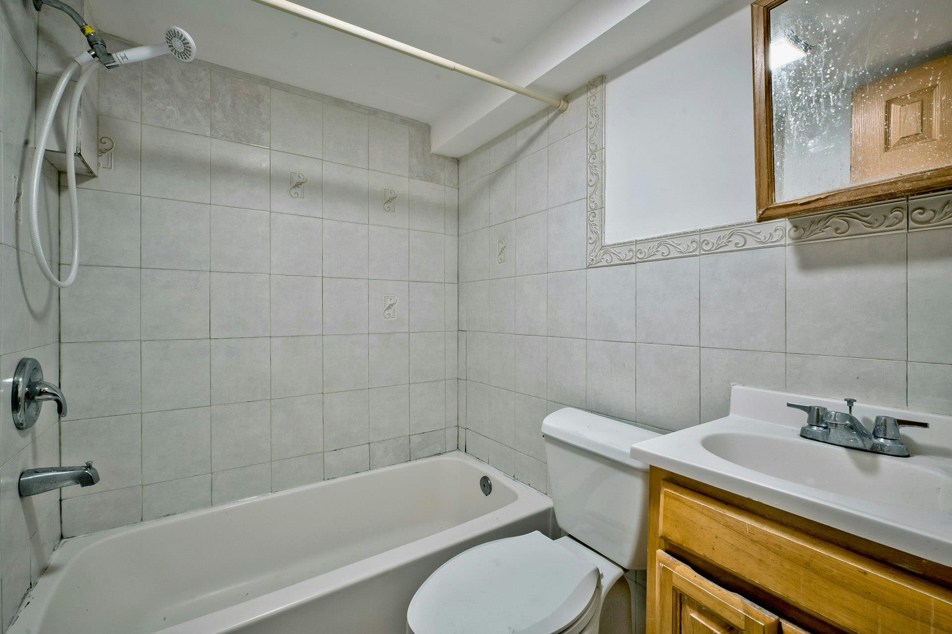 25 Virginia Drive, Elmont, NY 11003