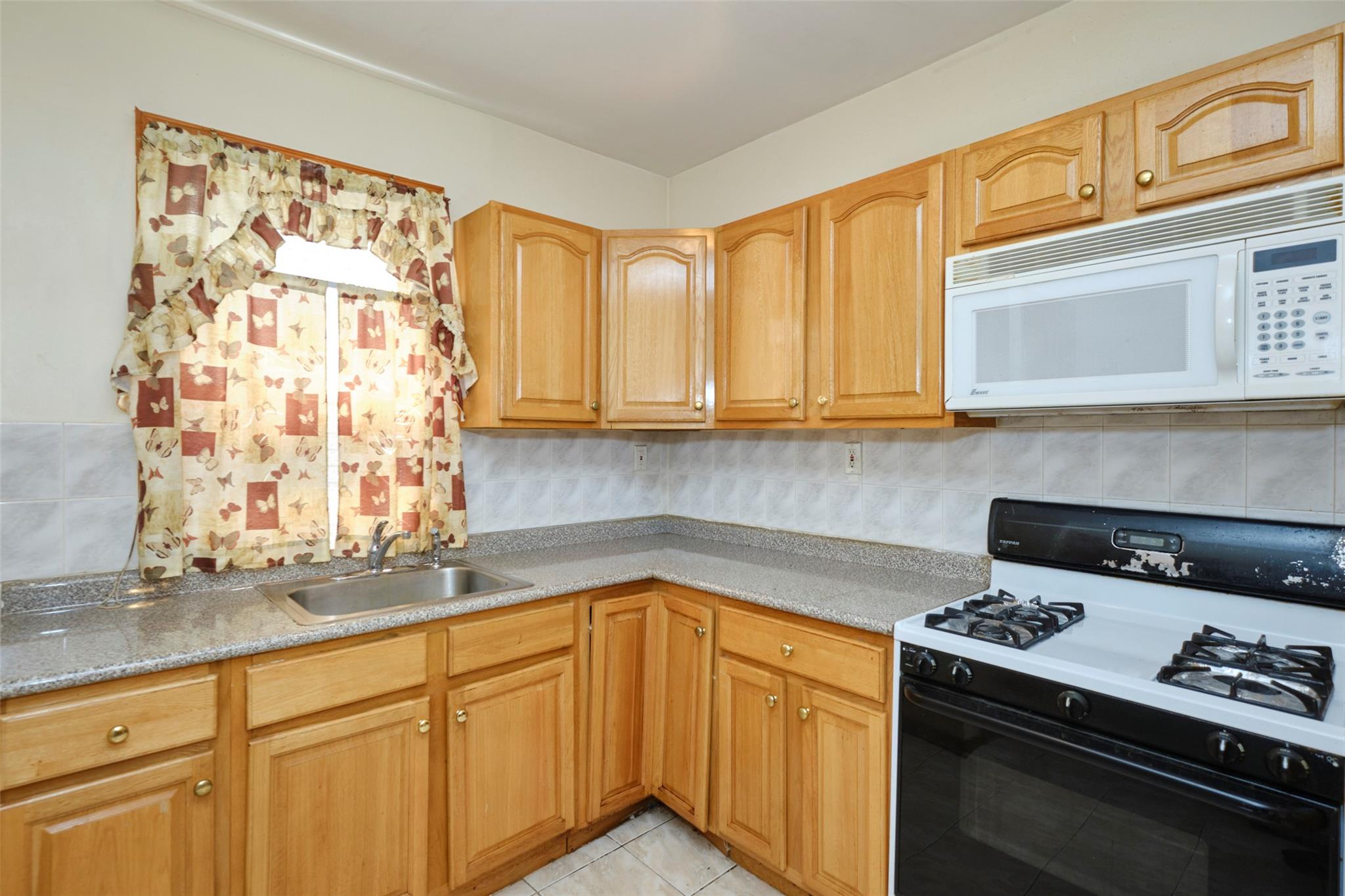 90-62 204th Street, Hollis, NY 11423