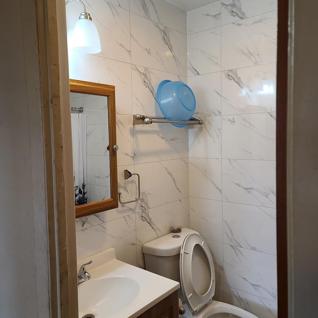 85-10 165 Street, Jamaica, NY 11432