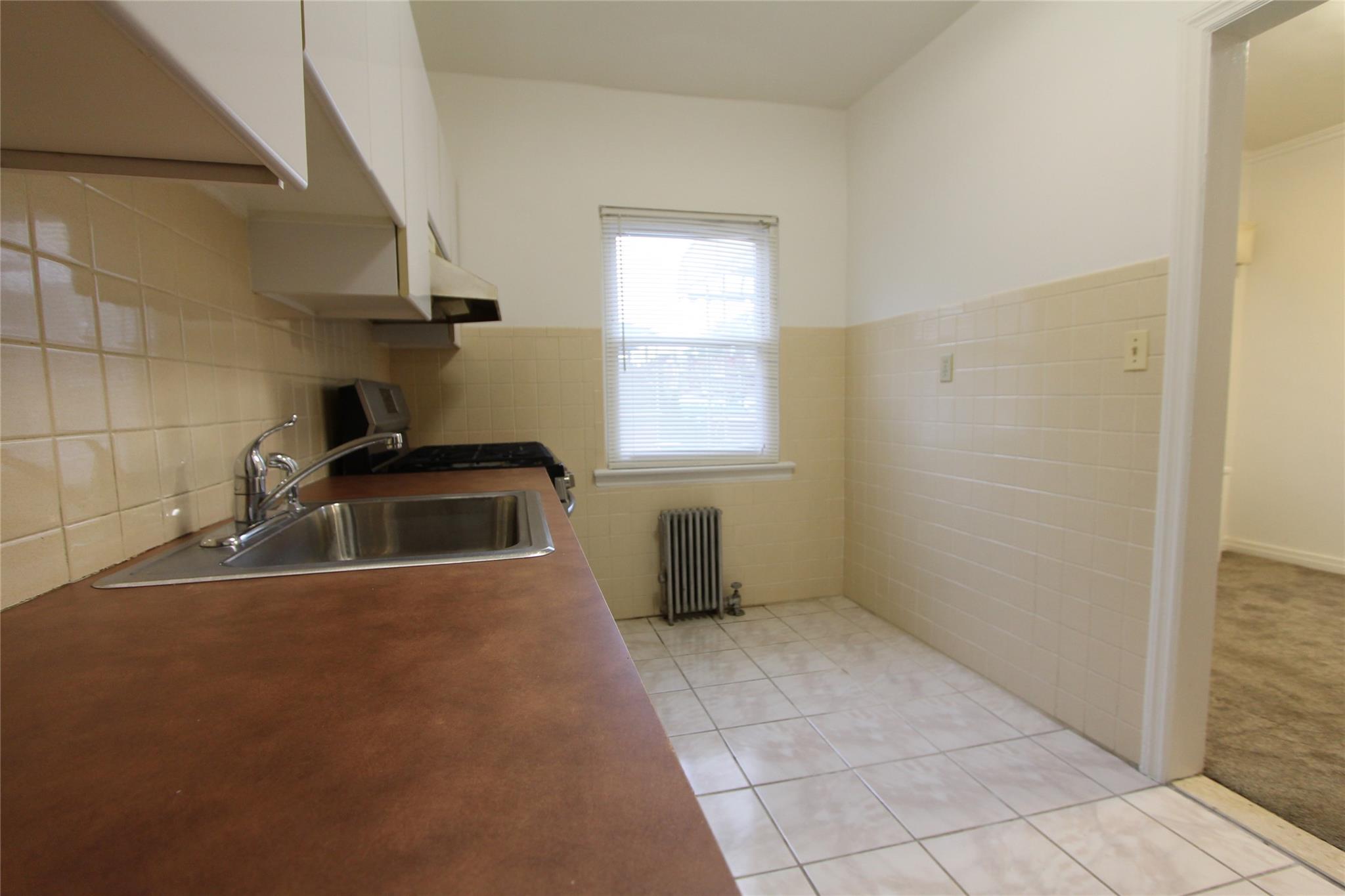 61-16 84th Street, Middle Village, NY 11379