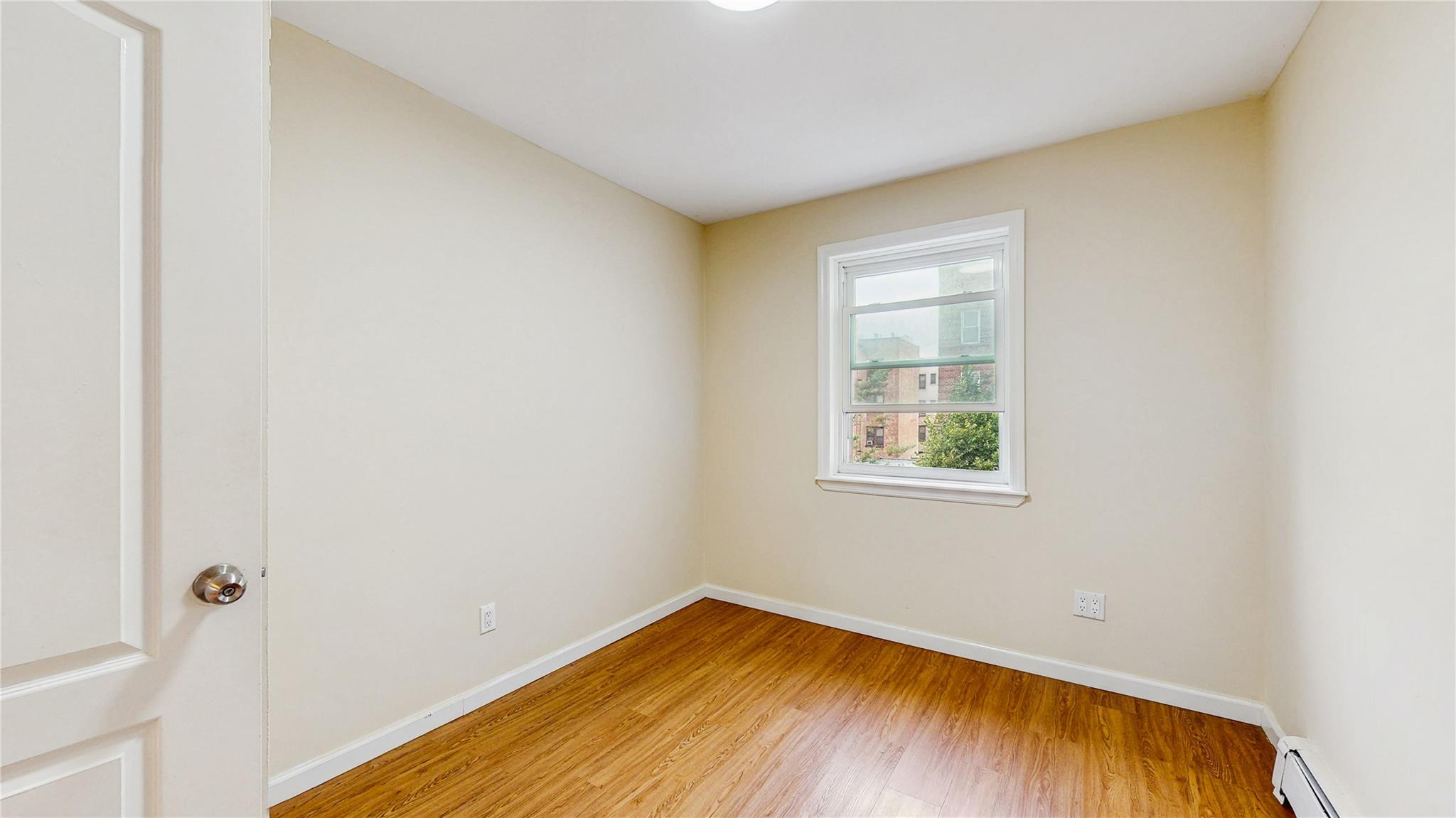 37-40 61st Street, Woodside, NY 11377