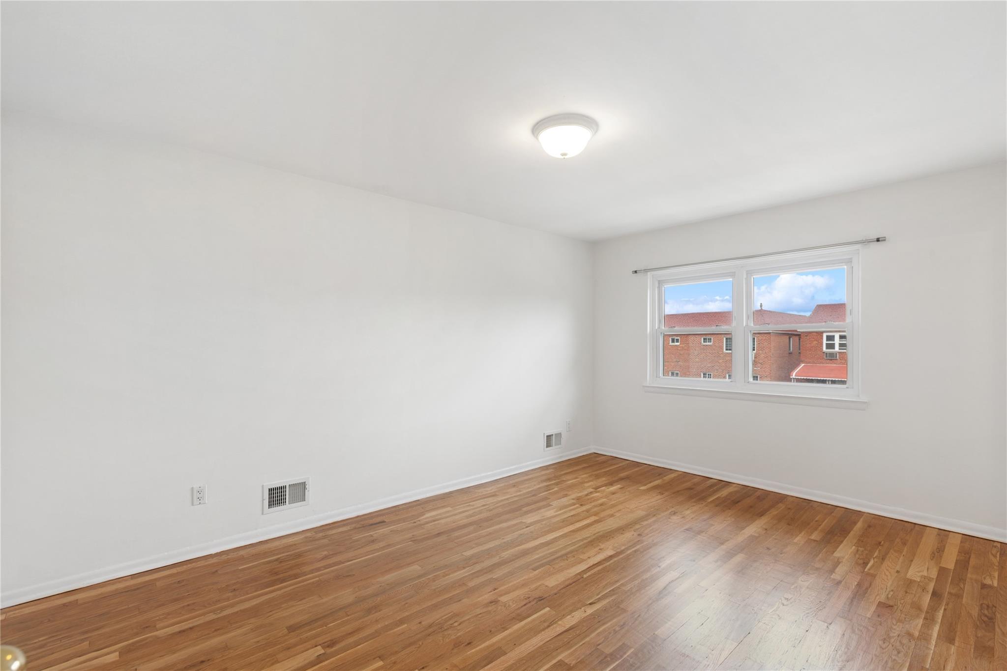 50-34 60th Street, Woodside, NY 11377
