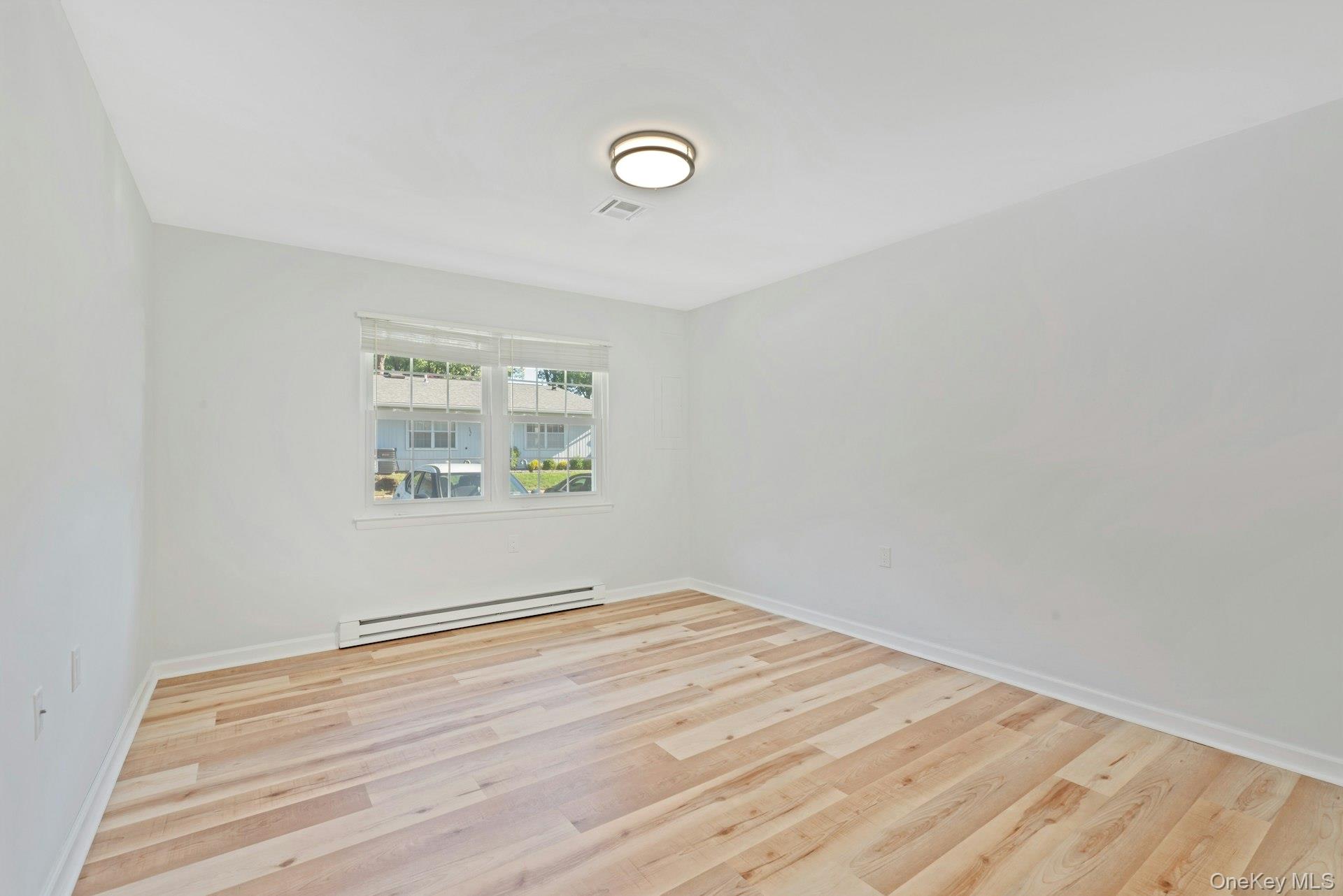 305C Torquay Court, Ridge, NY 11961