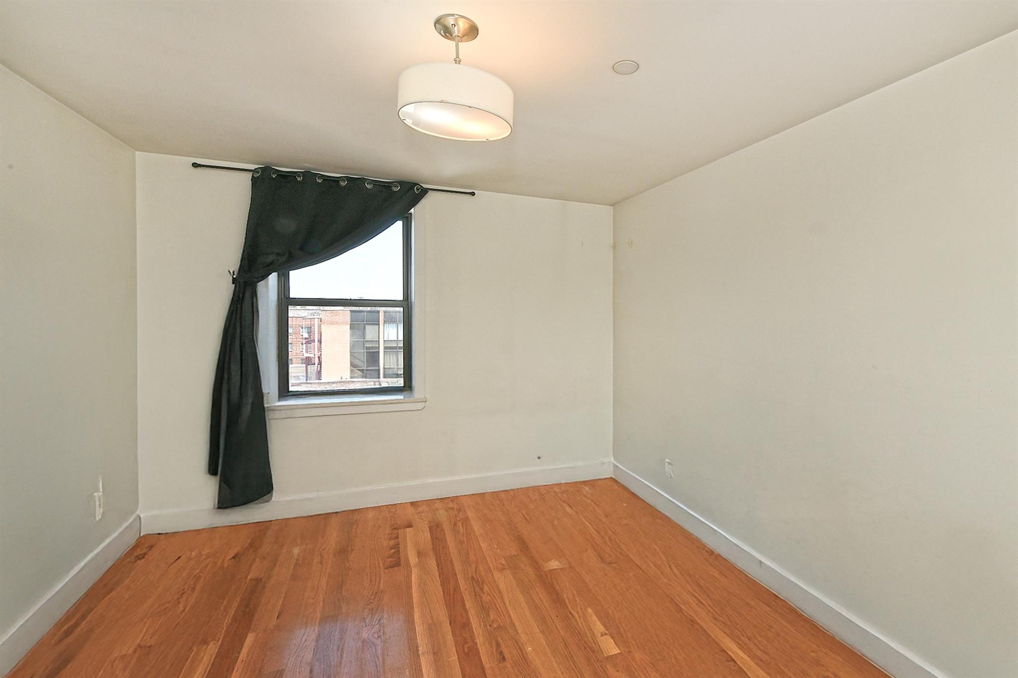 60-11 39 Avenue, Woodside, NY 11377