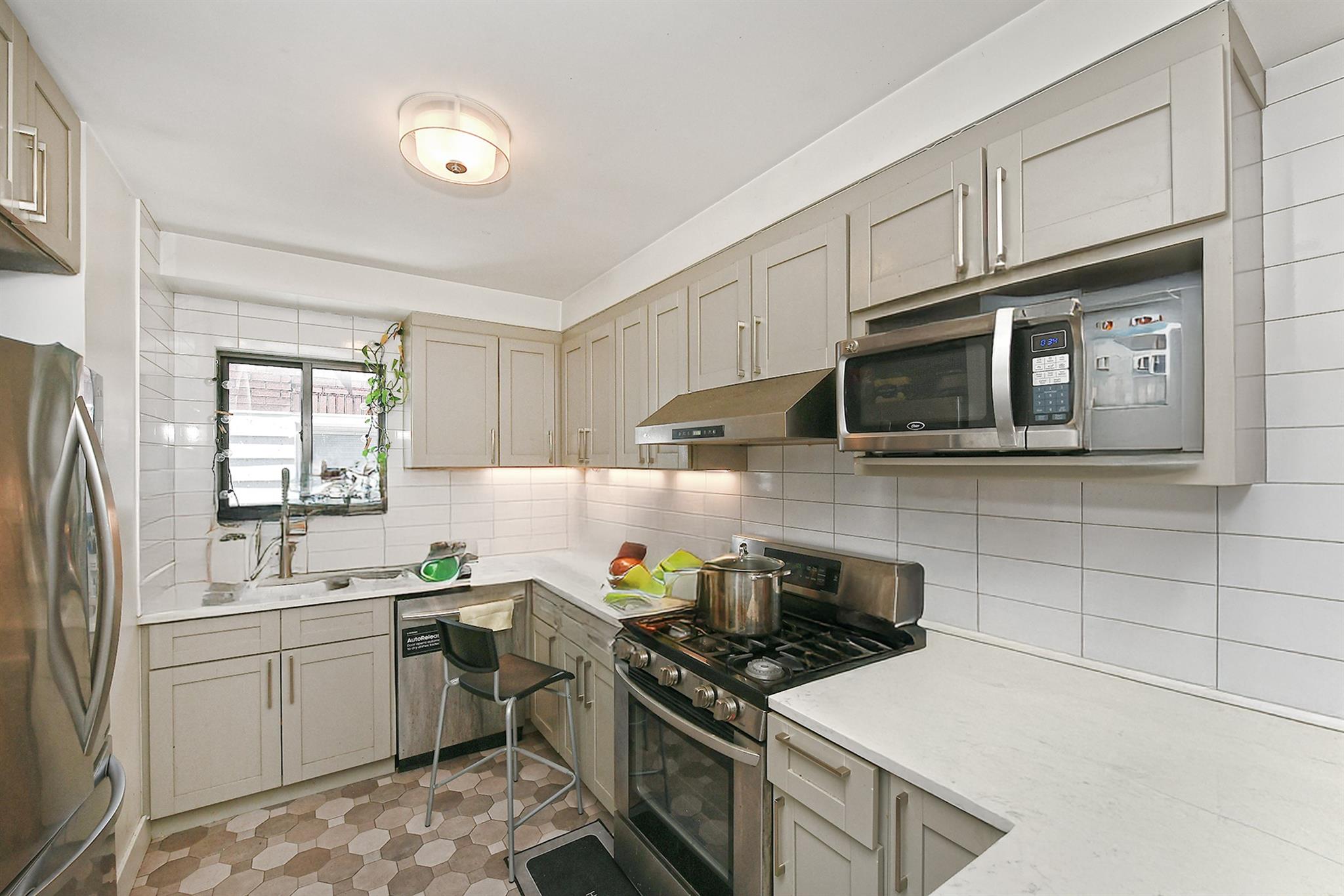 60-11 39 Avenue, Woodside, NY 11377