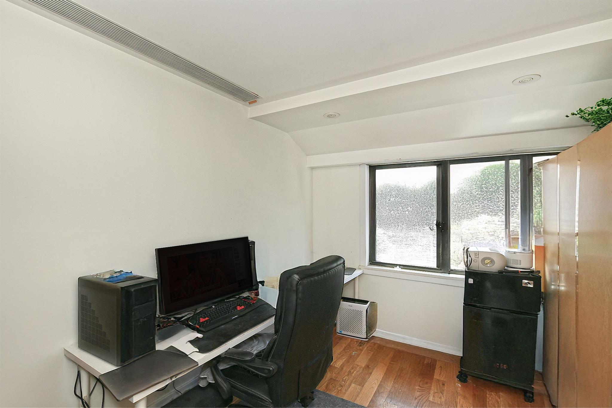 60-11 39 Avenue, Woodside, NY 11377