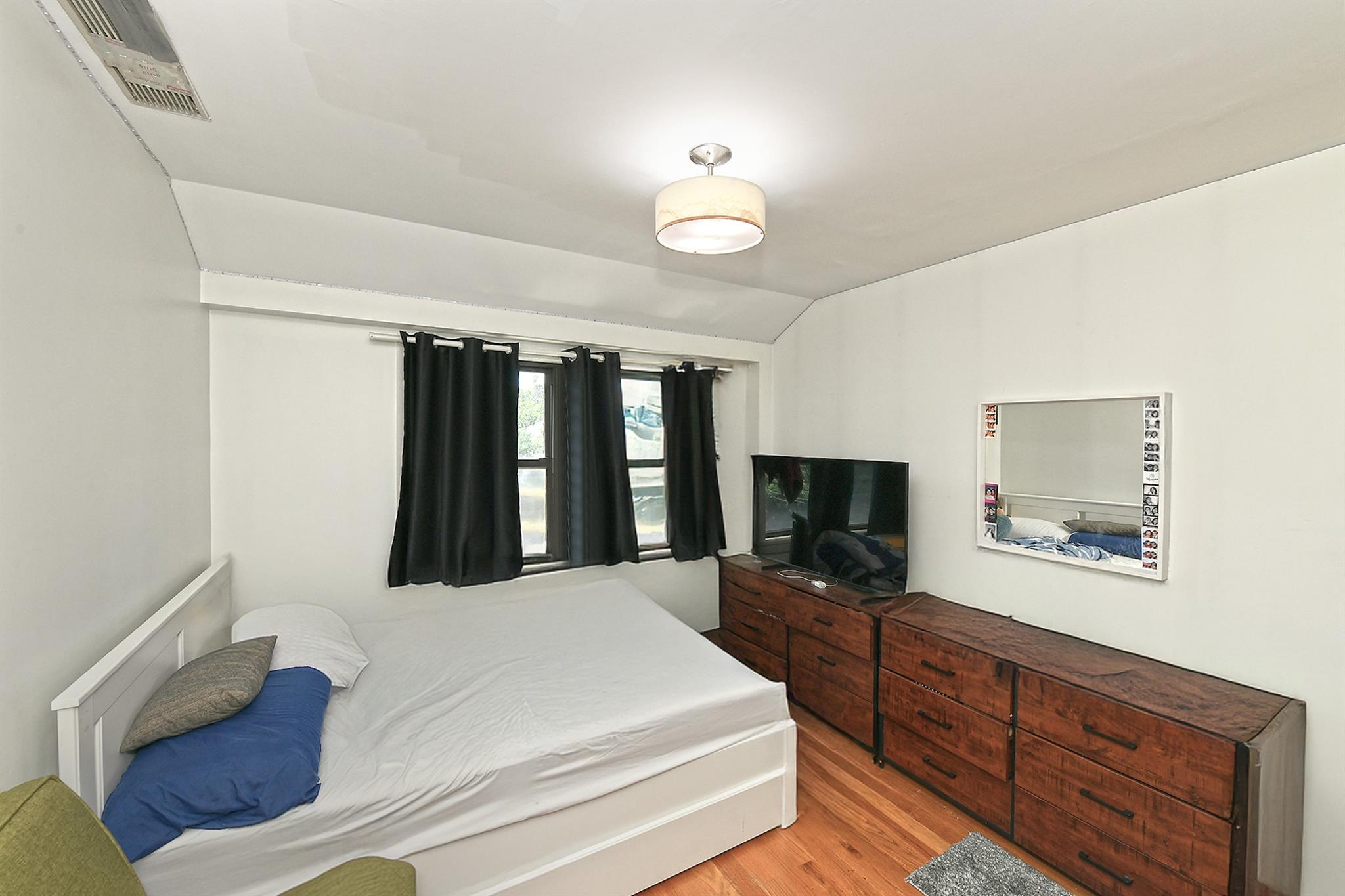 60-11 39 Avenue, Woodside, NY 11377