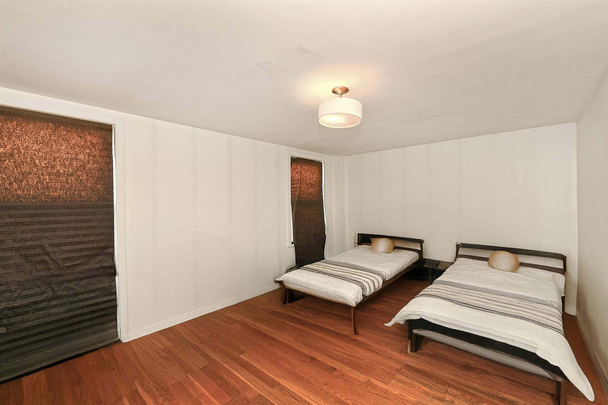 60-11 39 Avenue, Woodside, NY 11377