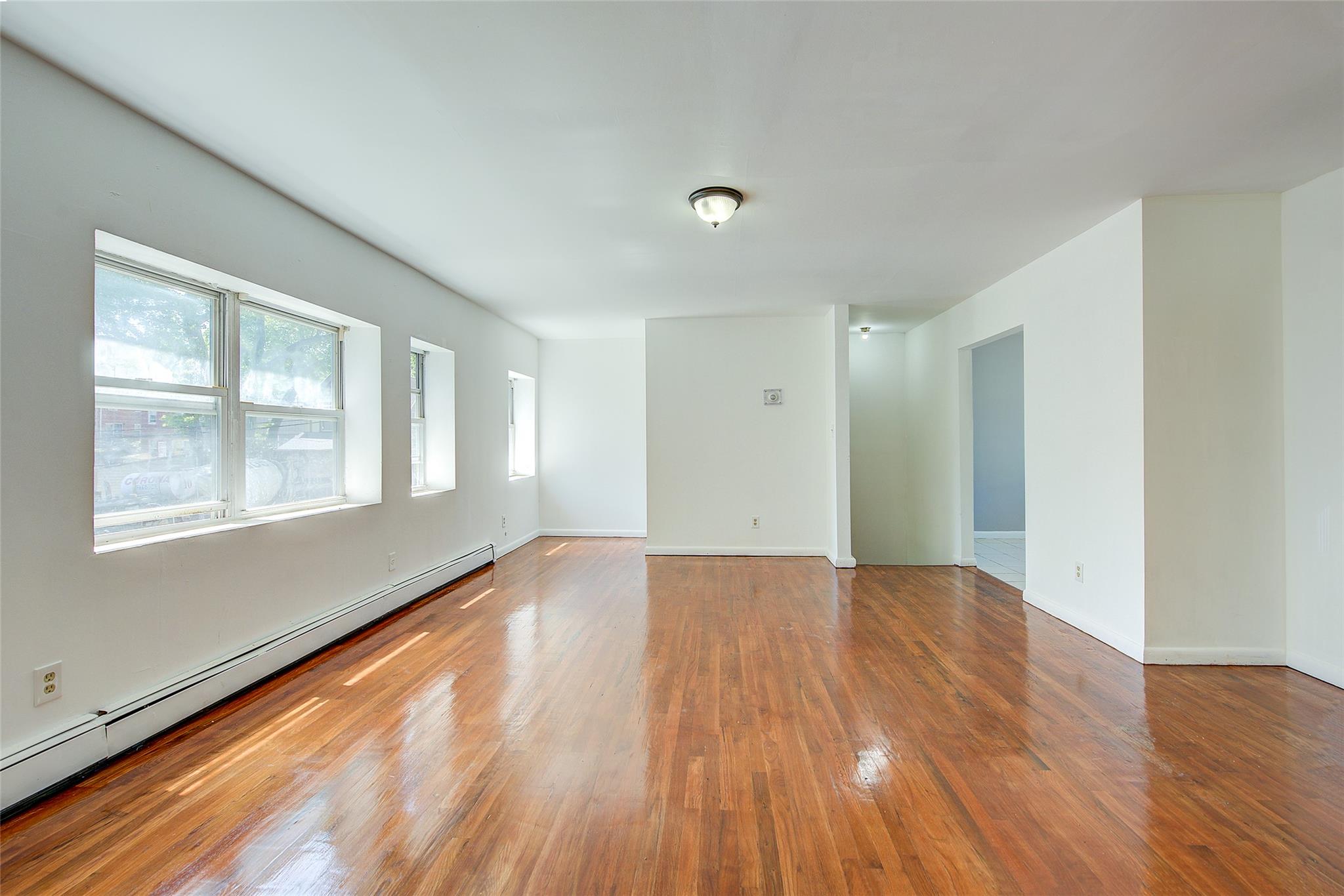 39-32 54th Street, Woodside, NY 11377