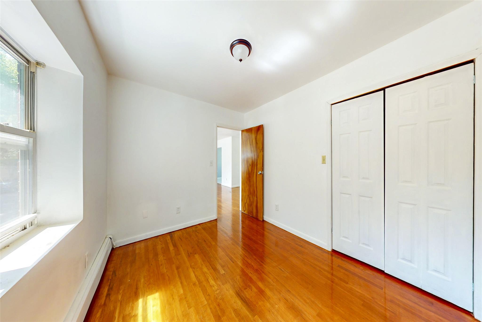 39-32 54th Street, Woodside, NY 11377