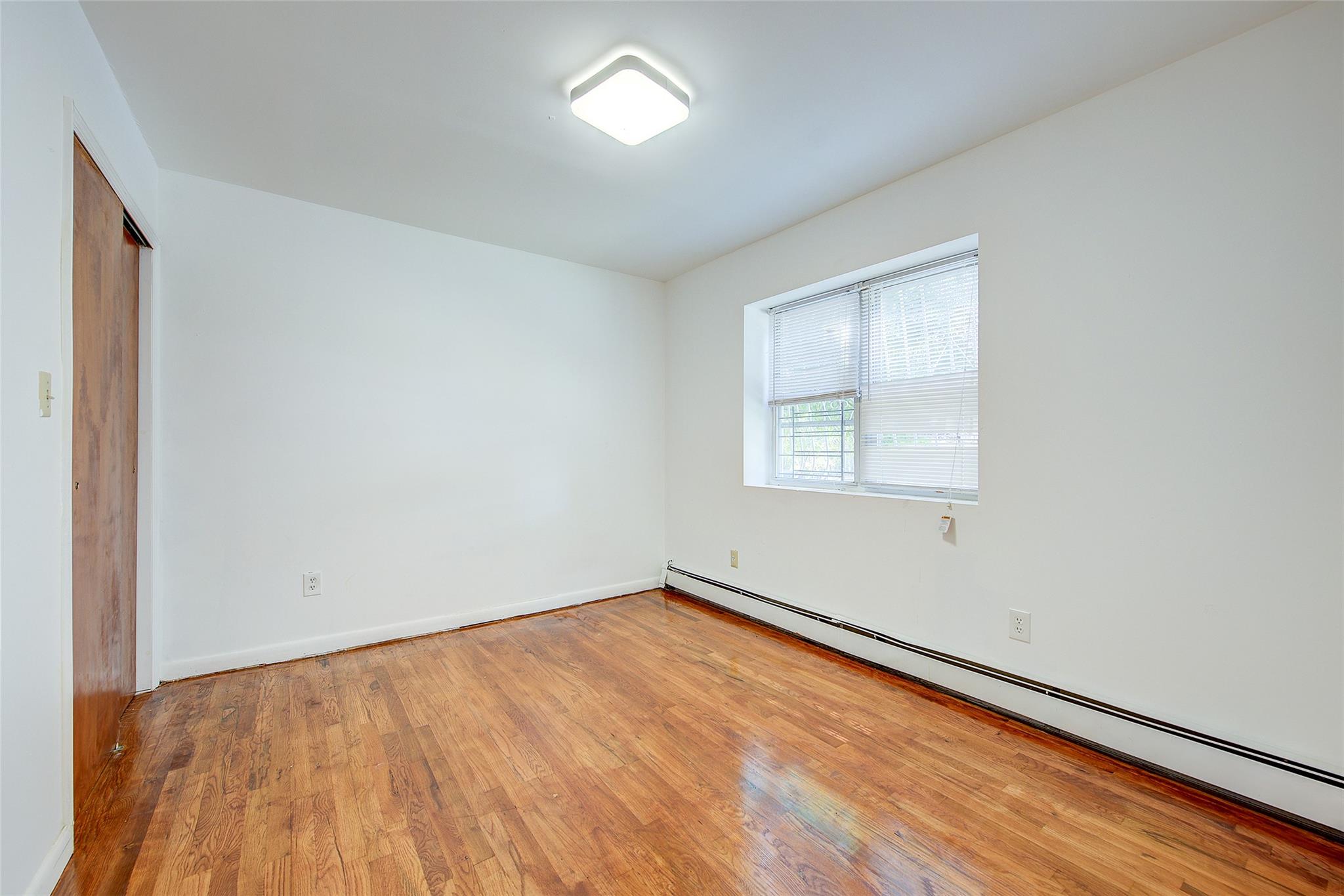 39-32 54th Street, Woodside, NY 11377