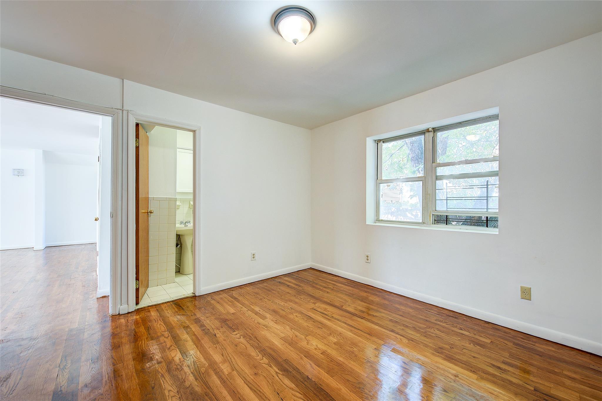 39-32 54th Street, Woodside, NY 11377