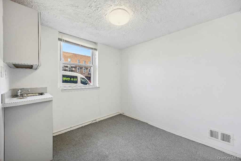 214-04 18th Avenue, Bayside, NY 11360