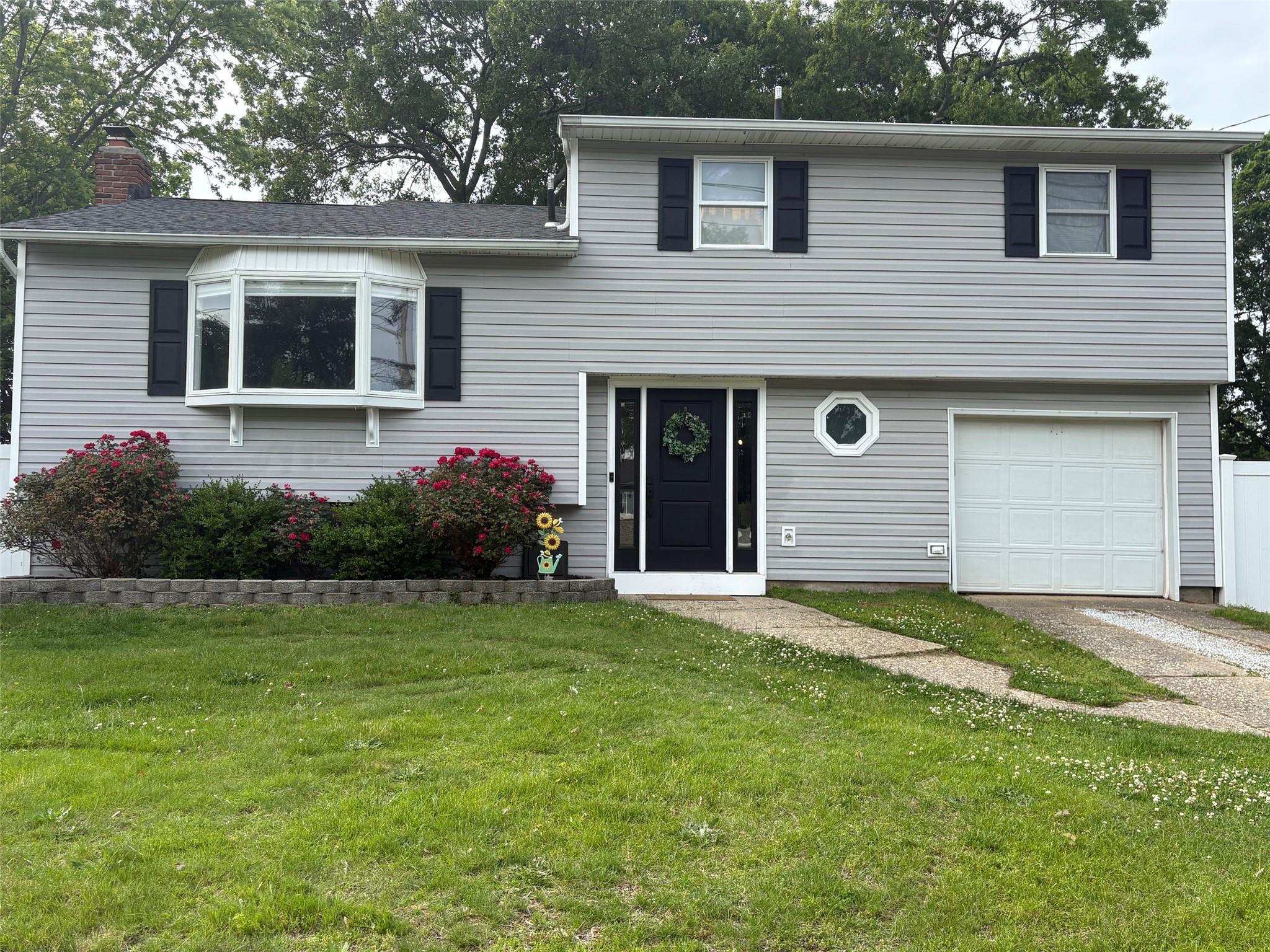 93 Holiday Park Drive, Centereach, NY 11720