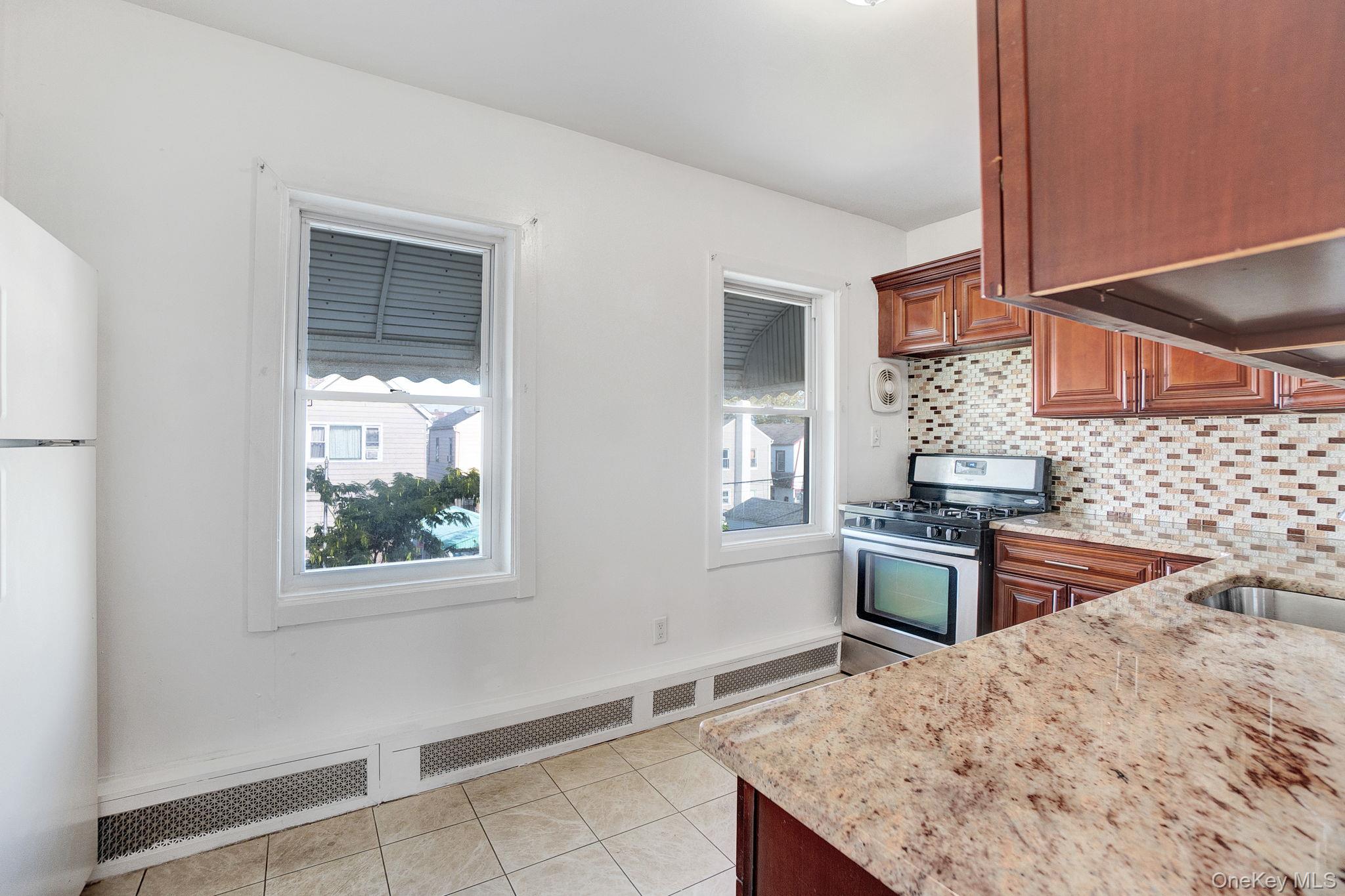 90-31 185TH Street, Hollis, NY 11423