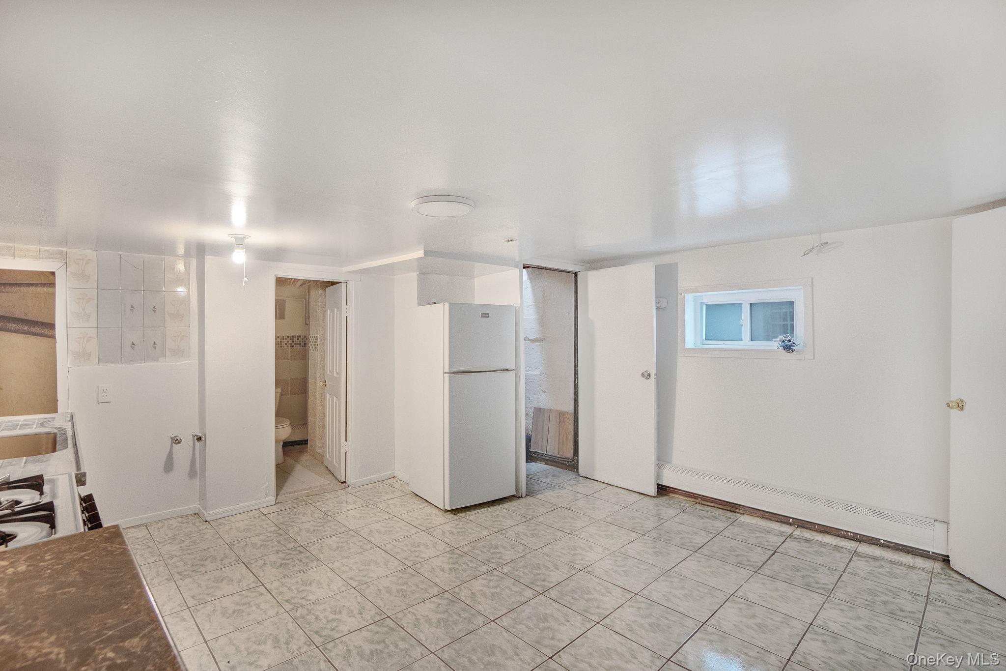 90-31 185TH Street, Hollis, NY 11423