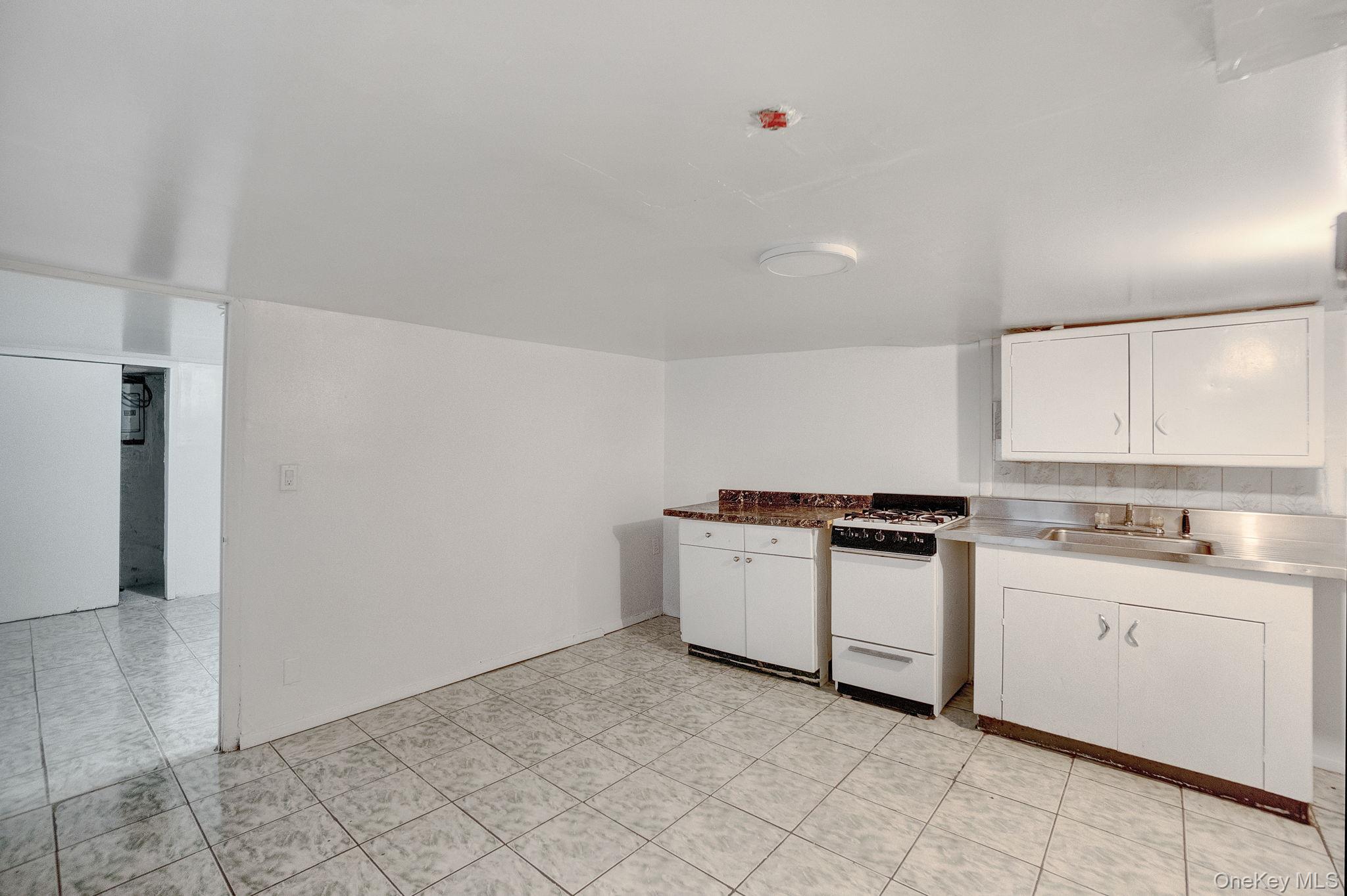 90-31 185TH Street, Hollis, NY 11423