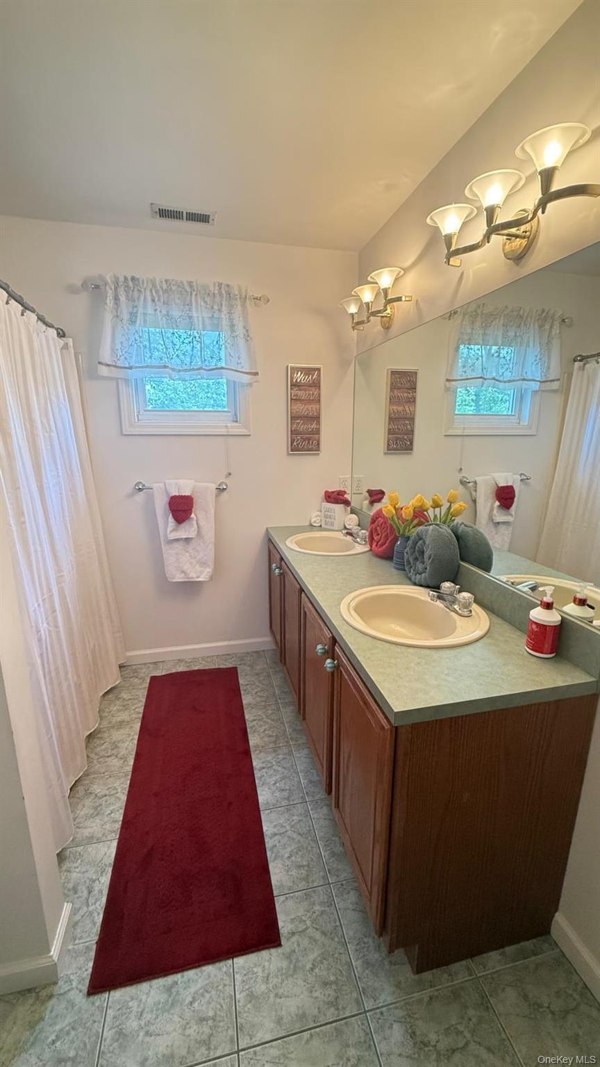 65 Colin Drive, Shirley, NY 11967