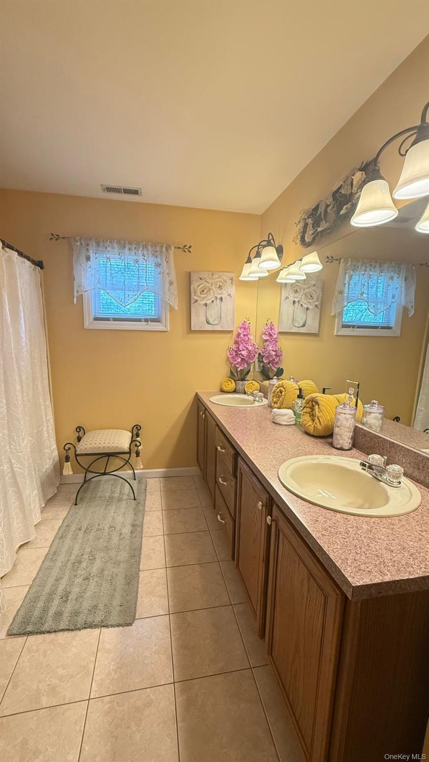 65 Colin Drive, Shirley, NY 11967