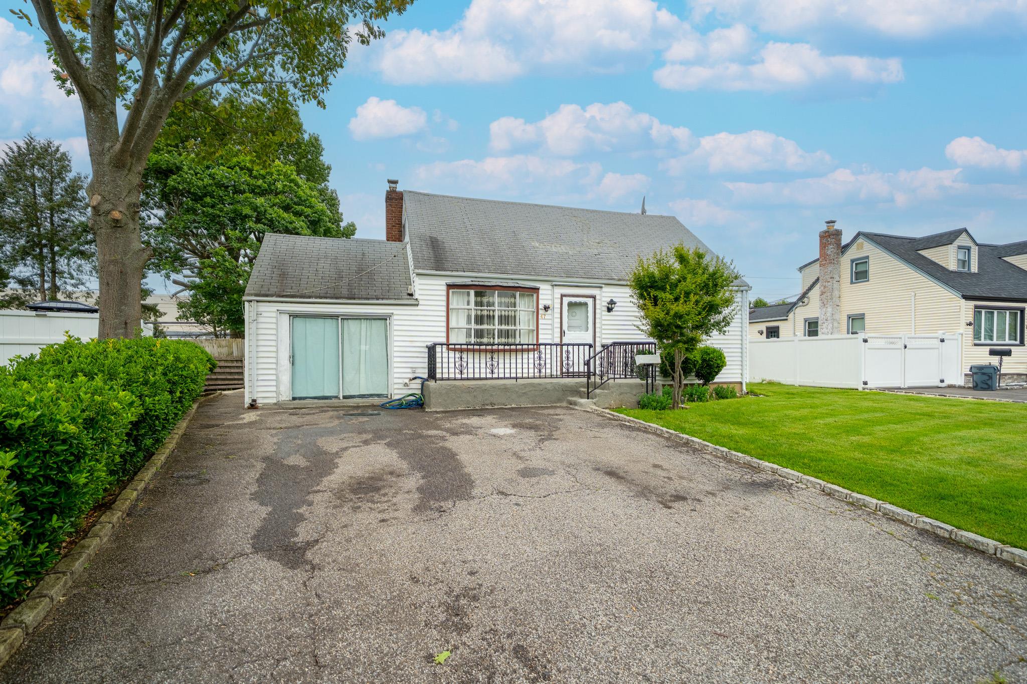 47 Cardinal Road, Levittown, NY 11756