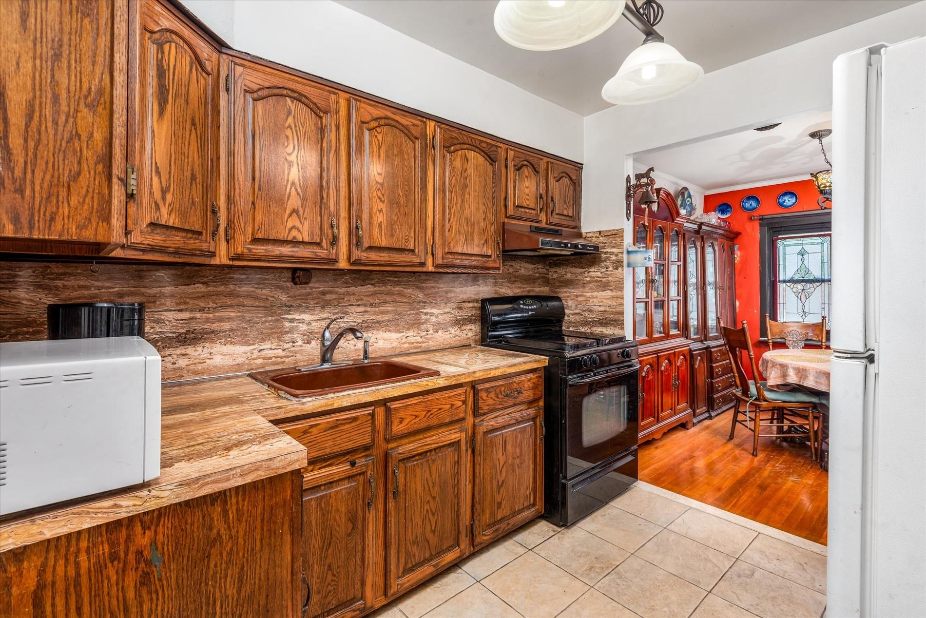 5974 Fresh Pond Road, Maspeth, NY 11378