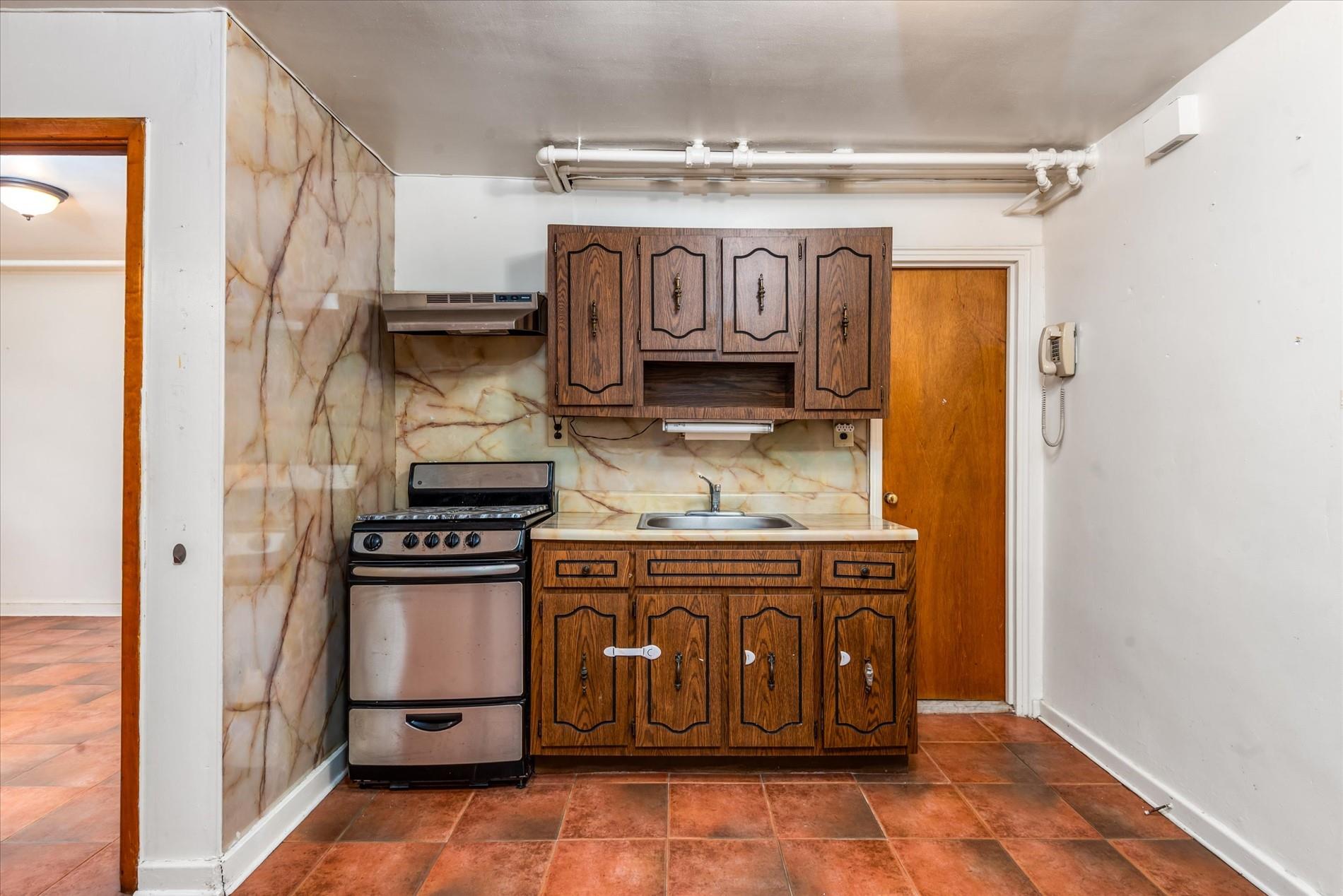 5974 Fresh Pond Road, Maspeth, NY 11378