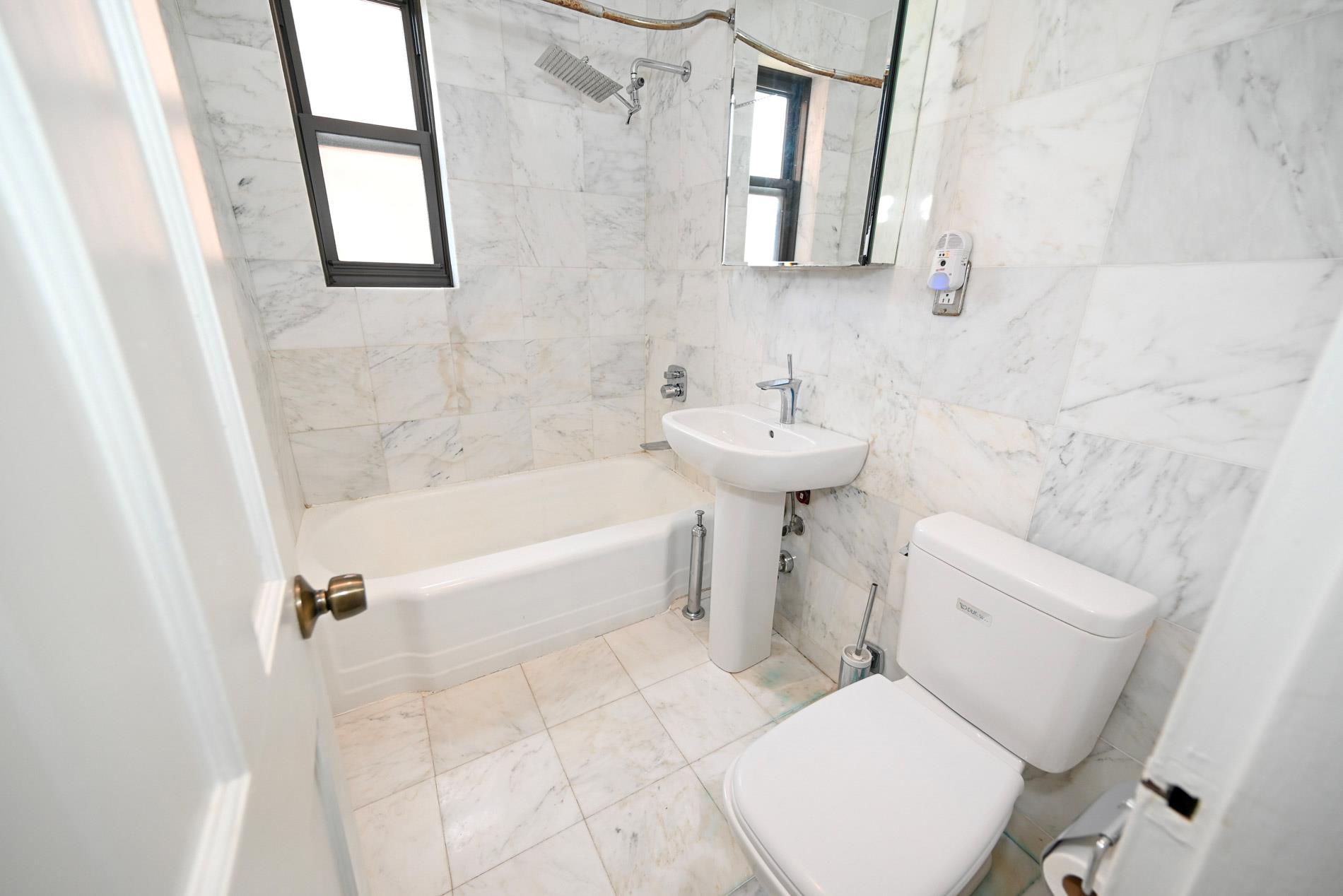 84-01 Main St # 410, Briarwood, NY 11435