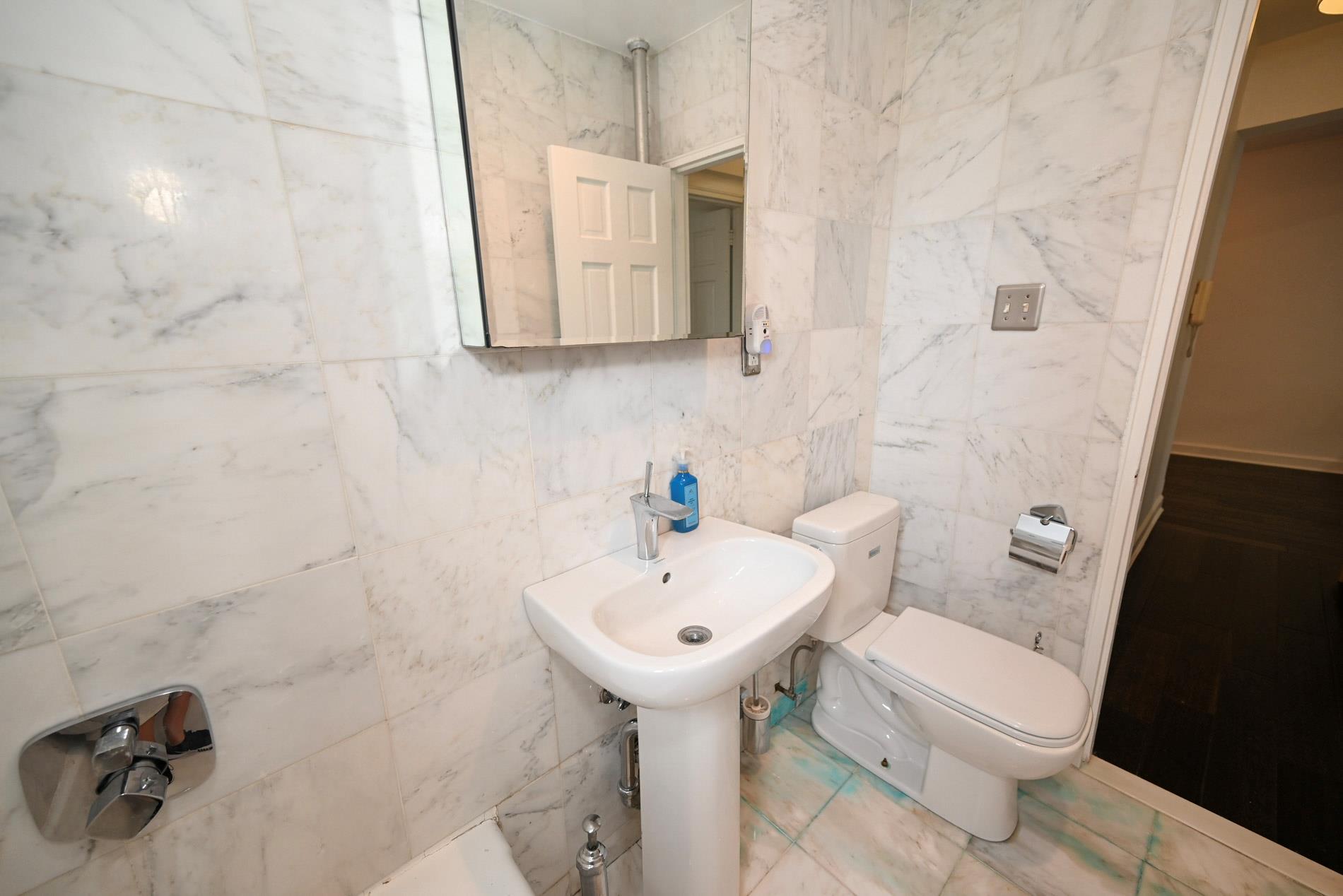 84-01 Main St # 410, Briarwood, NY 11435