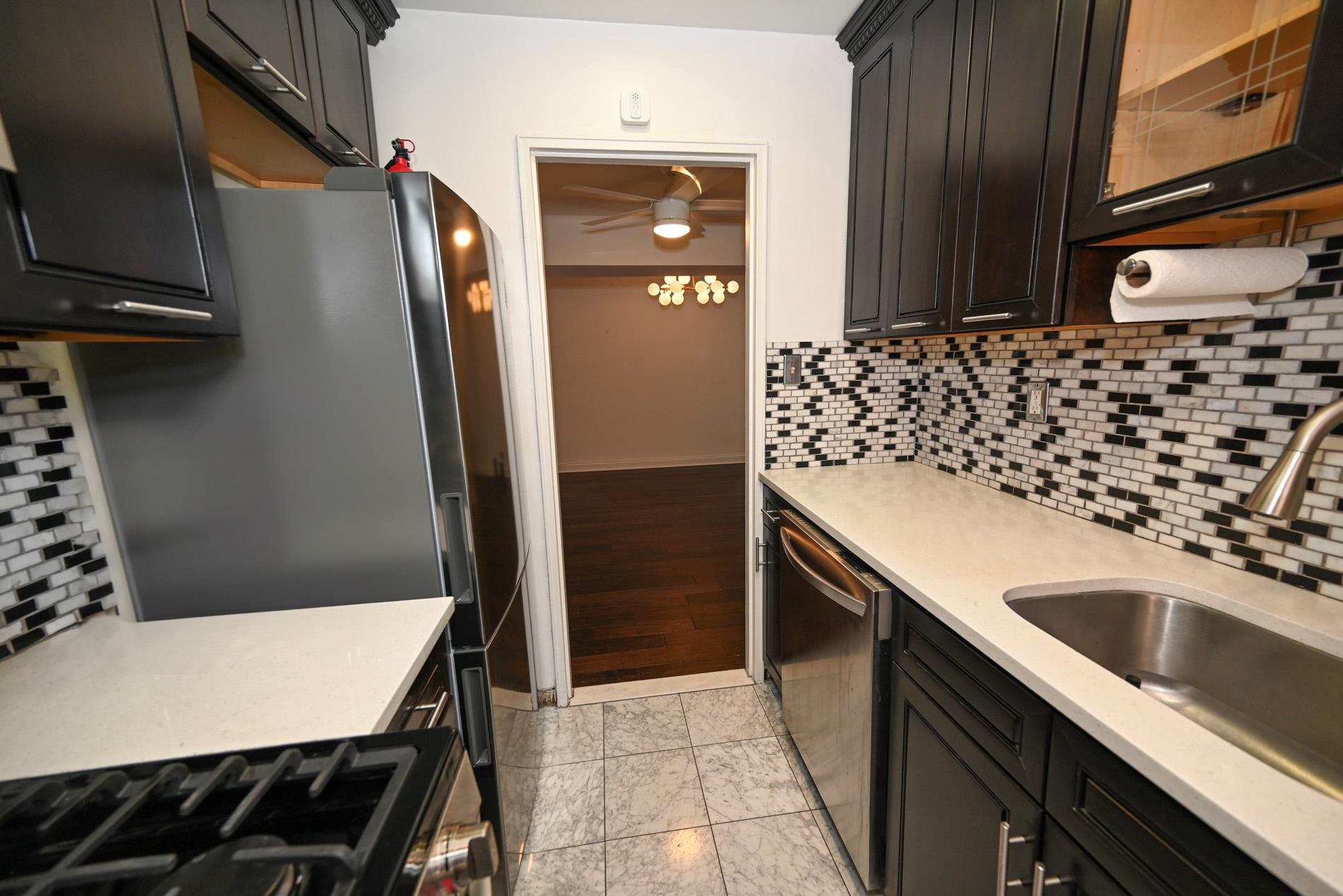 84-01 Main St # 410, Briarwood, NY 11435