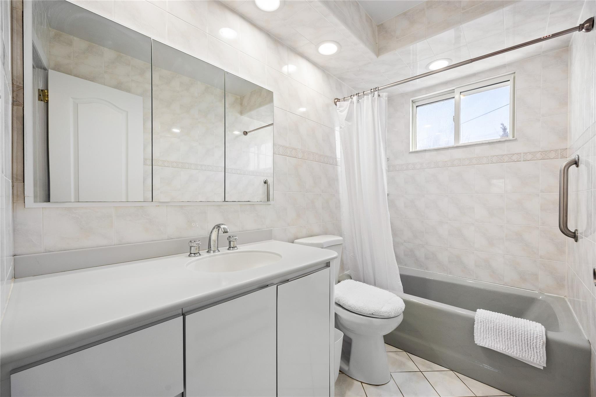 46 Norman Lane, Levittown, NY 11756