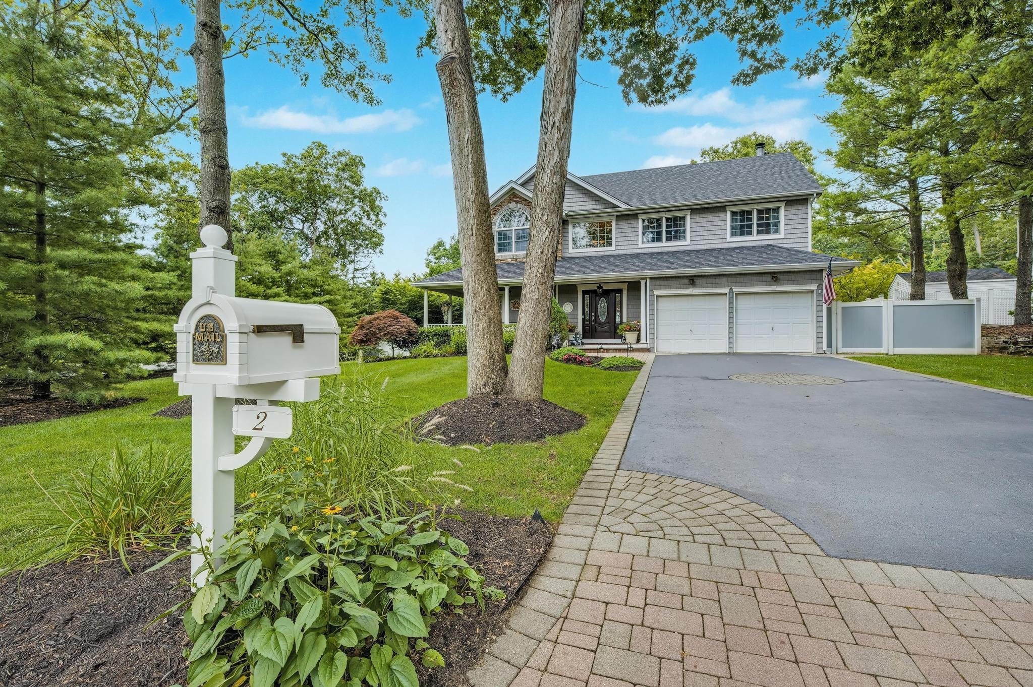 2 Whispering Woods Drive, Smithtown, NY 11787