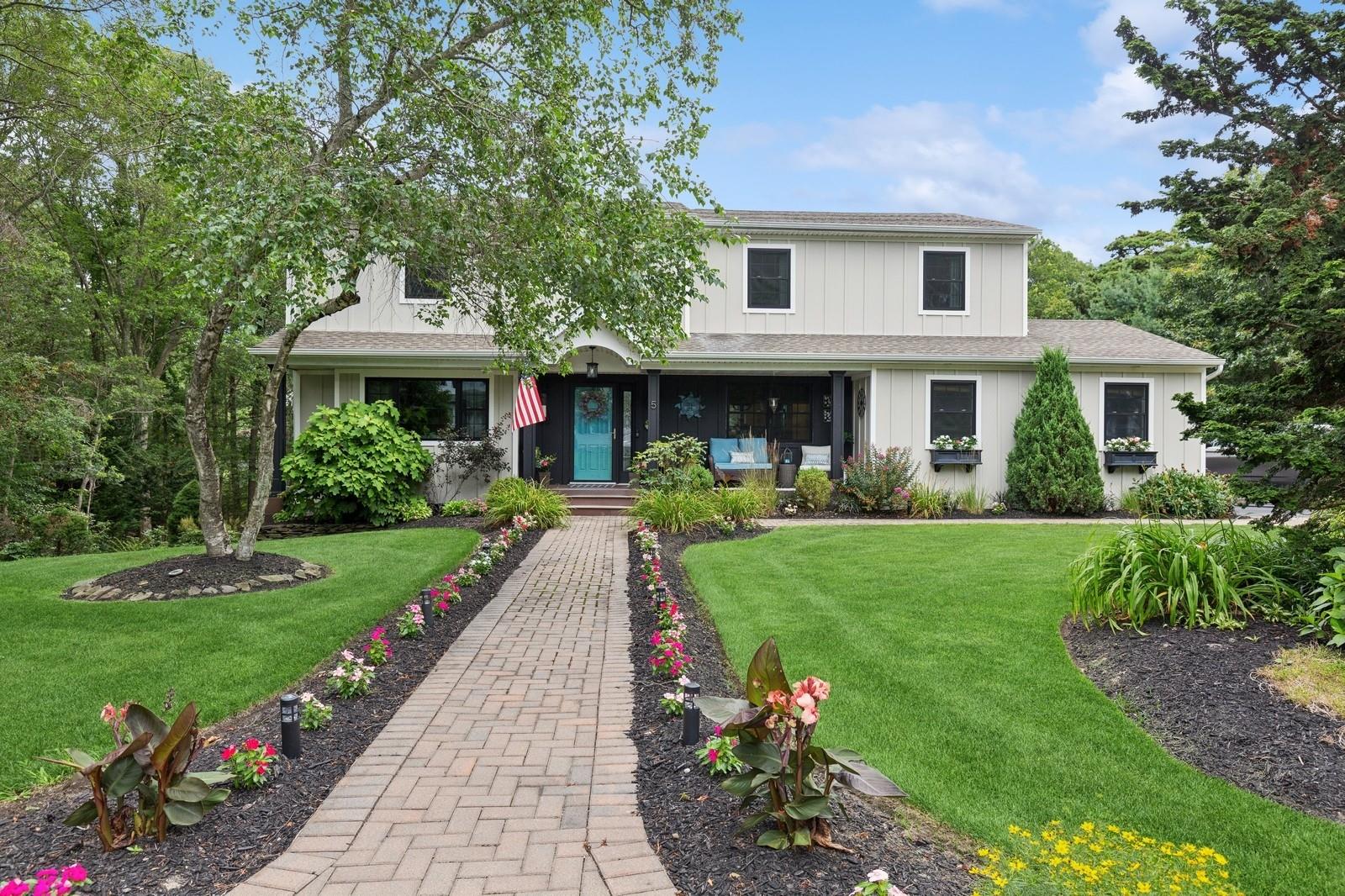 5 Woodbrook Circle, Holtsville, NY 11742