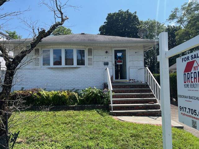 87 W Clinton Avenue, Roosevelt, NY 11575