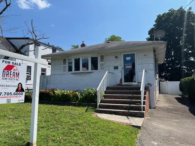 87 W Clinton Avenue, Roosevelt, NY 11575
